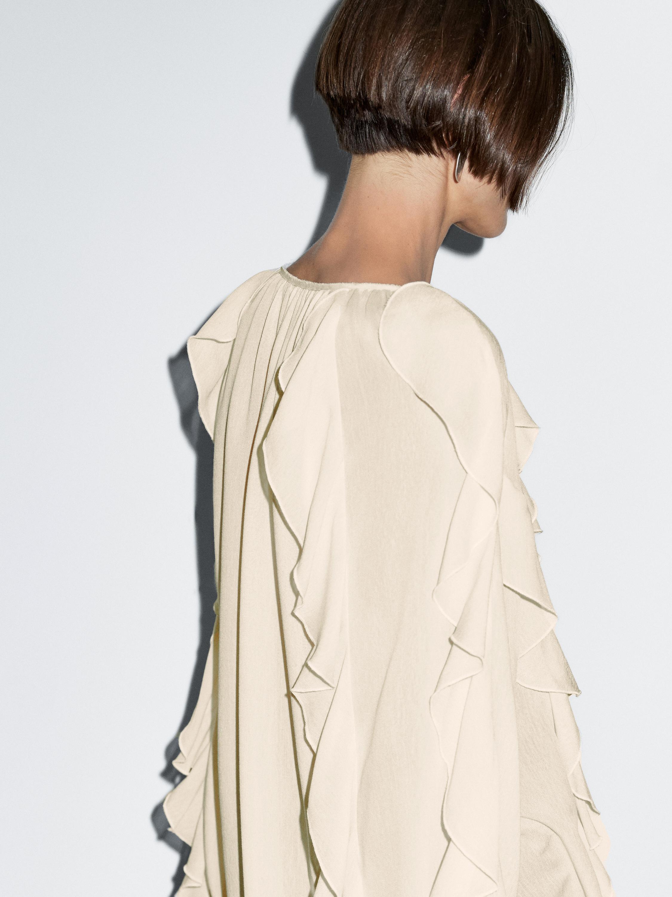 Flowing blouse with ruffles
