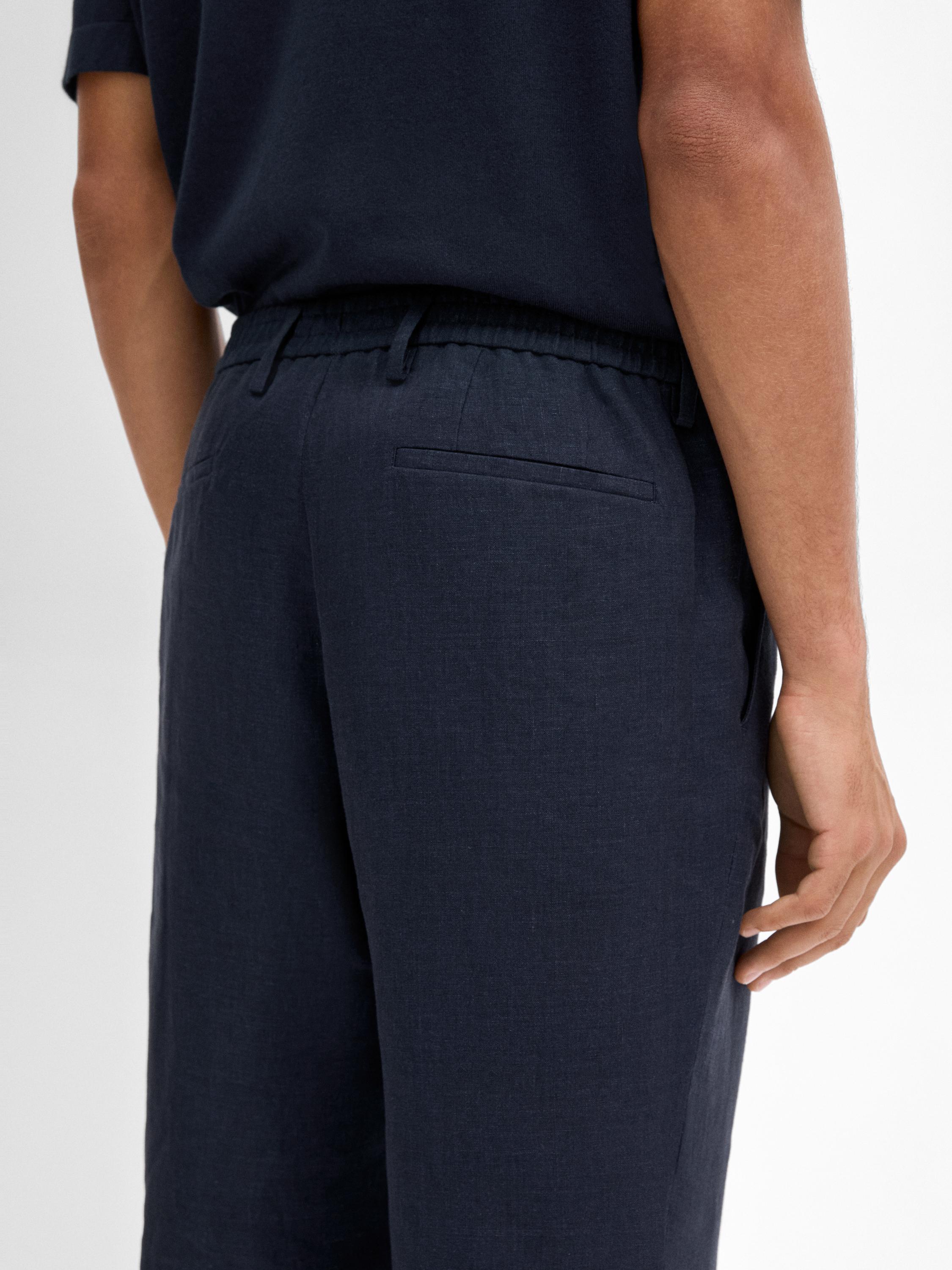 Pantalón regular 100% lino
