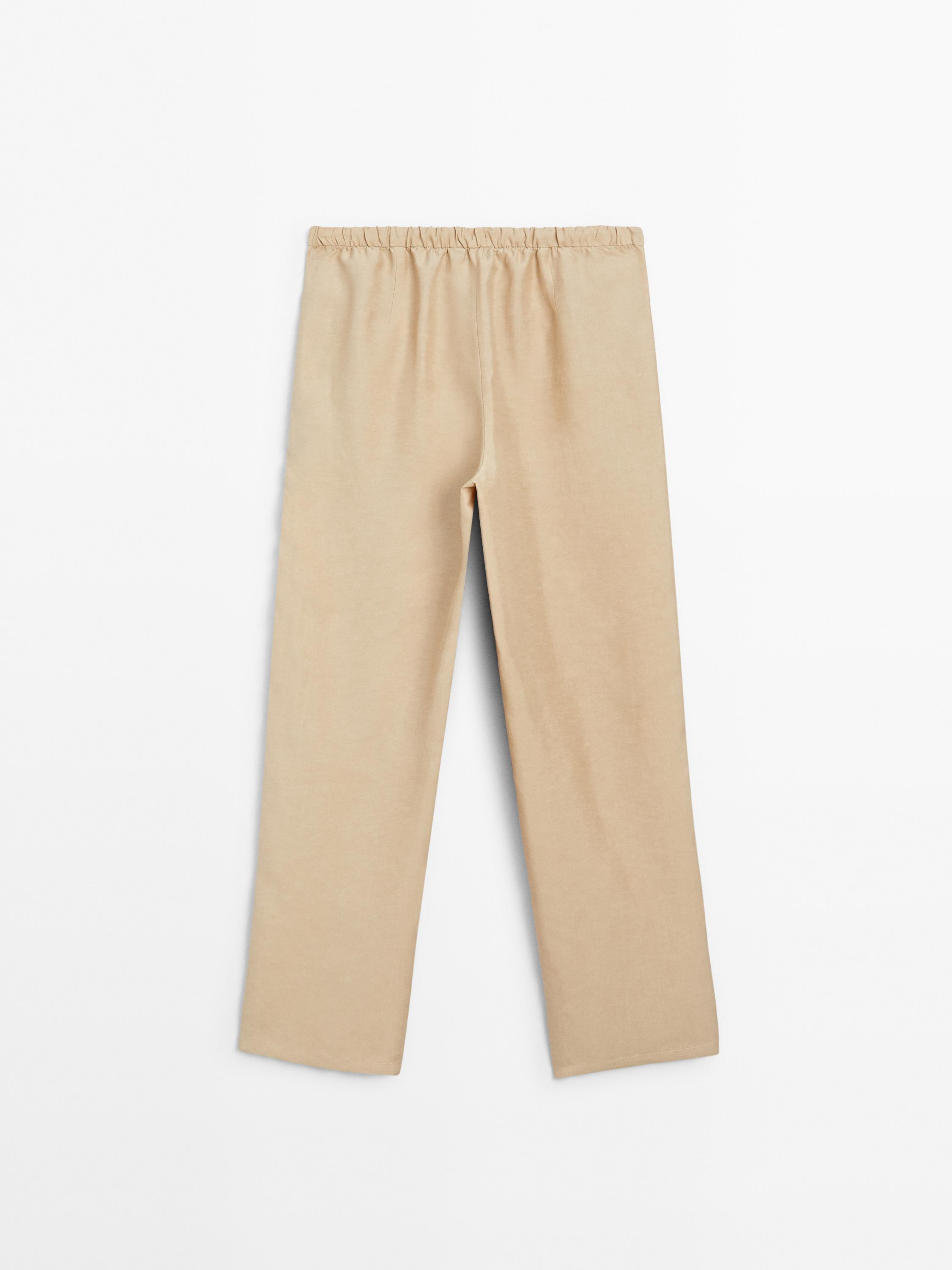 Flowing linen blend barrel fit trousers