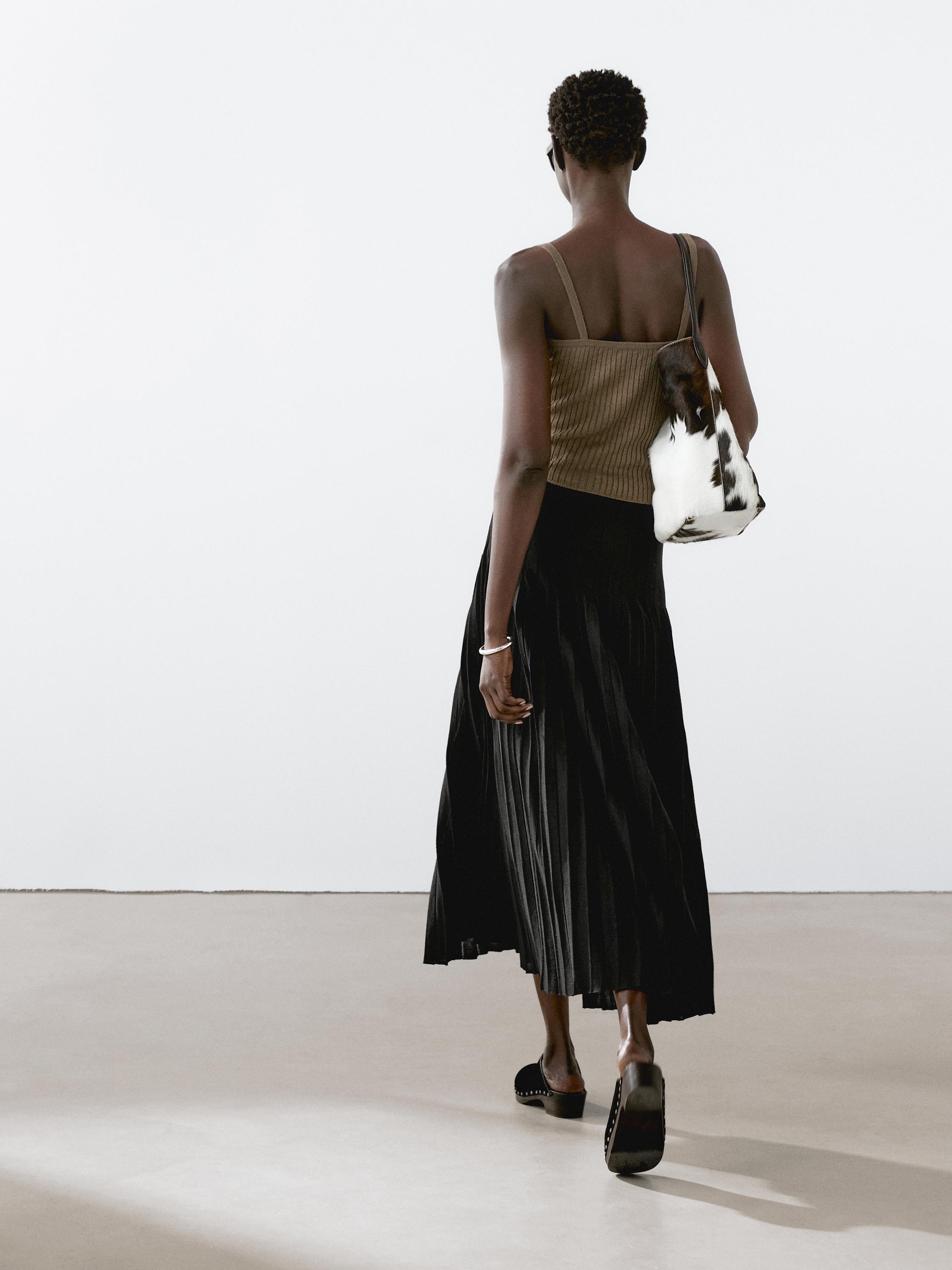 Jupe midi plissée transparences