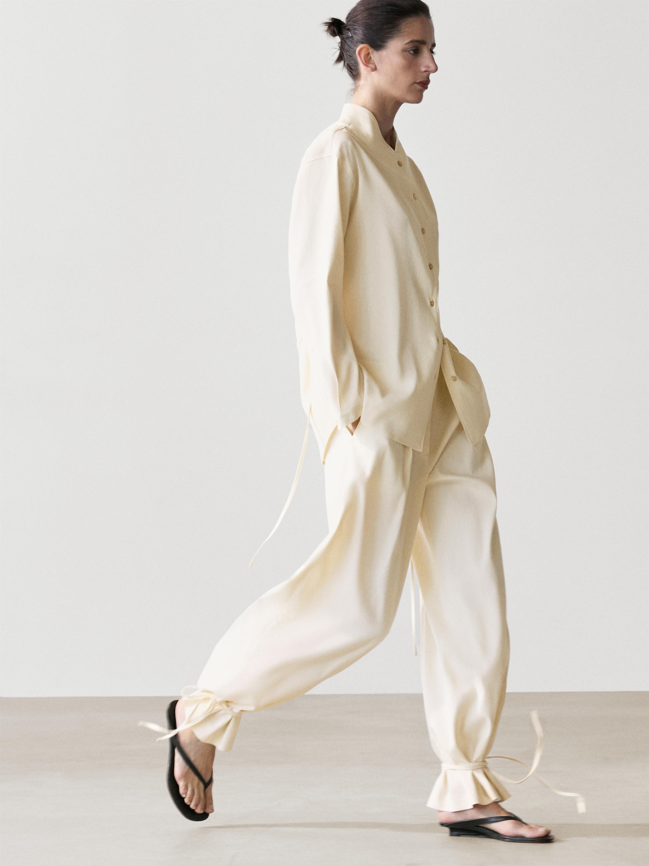 Flowing barrel fit trousers — CREAM