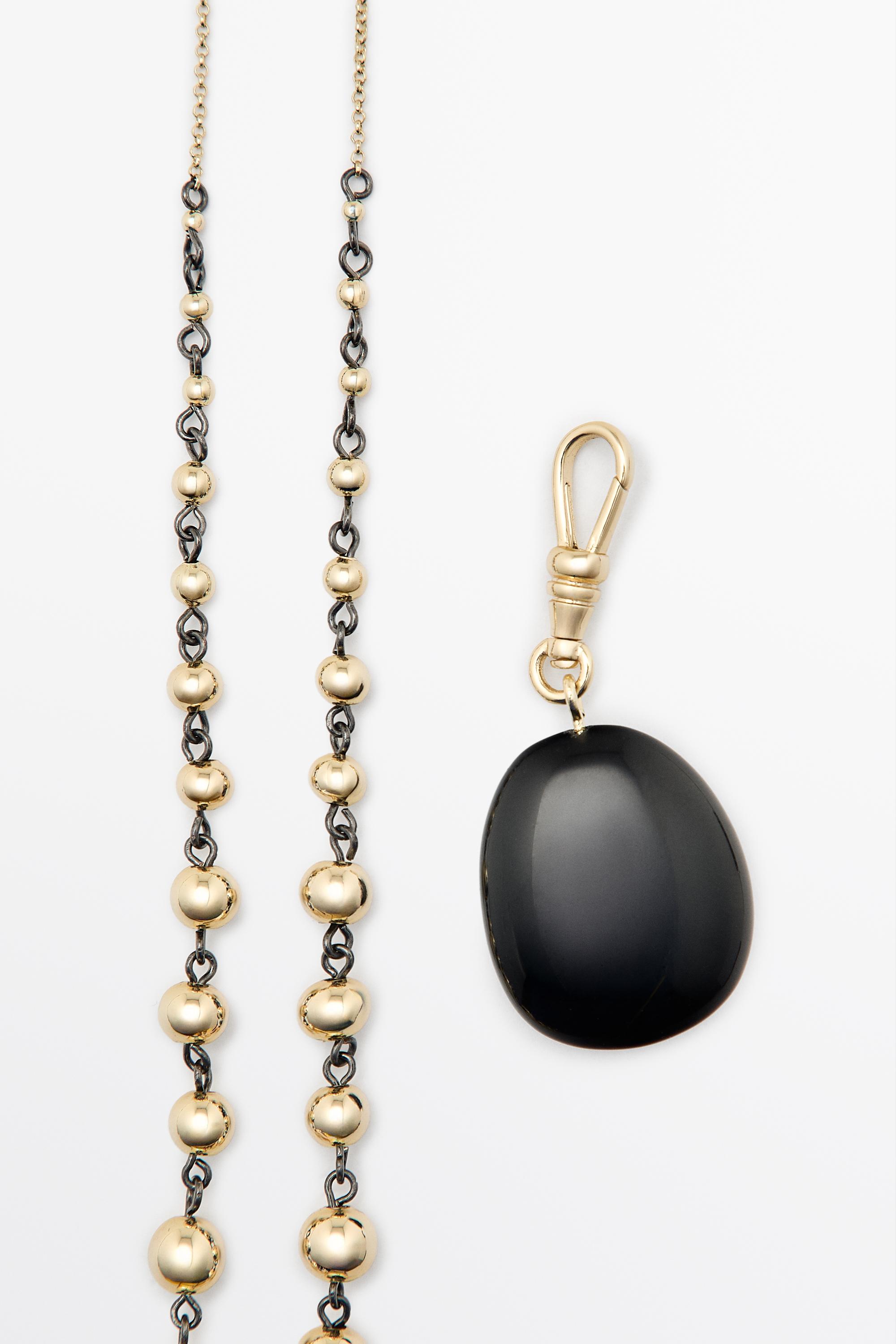 Beaded chain necklace with onyx piece — GOLDEN