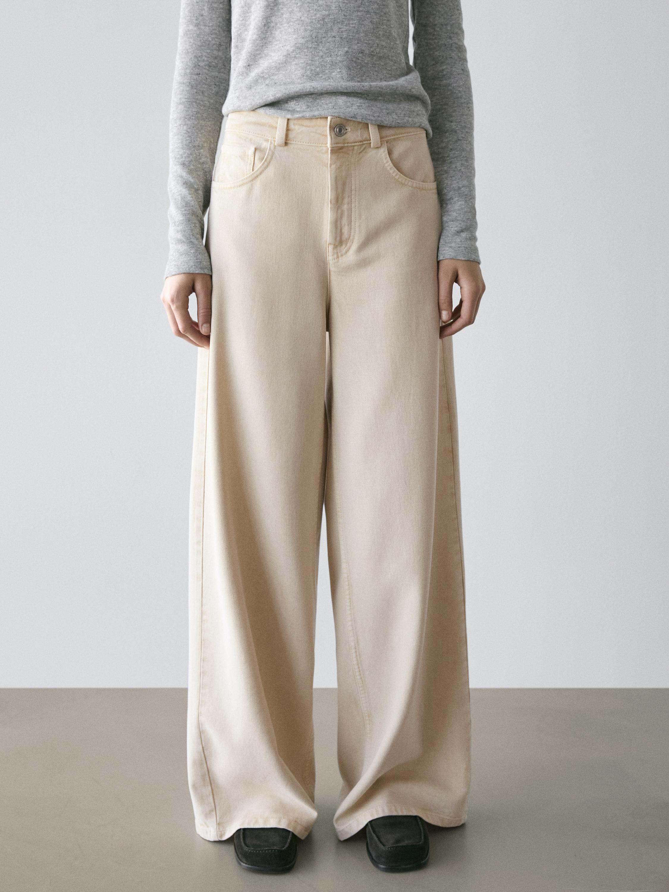 Vanilla wide-leg low-rise pants set with side pockets and a front button.