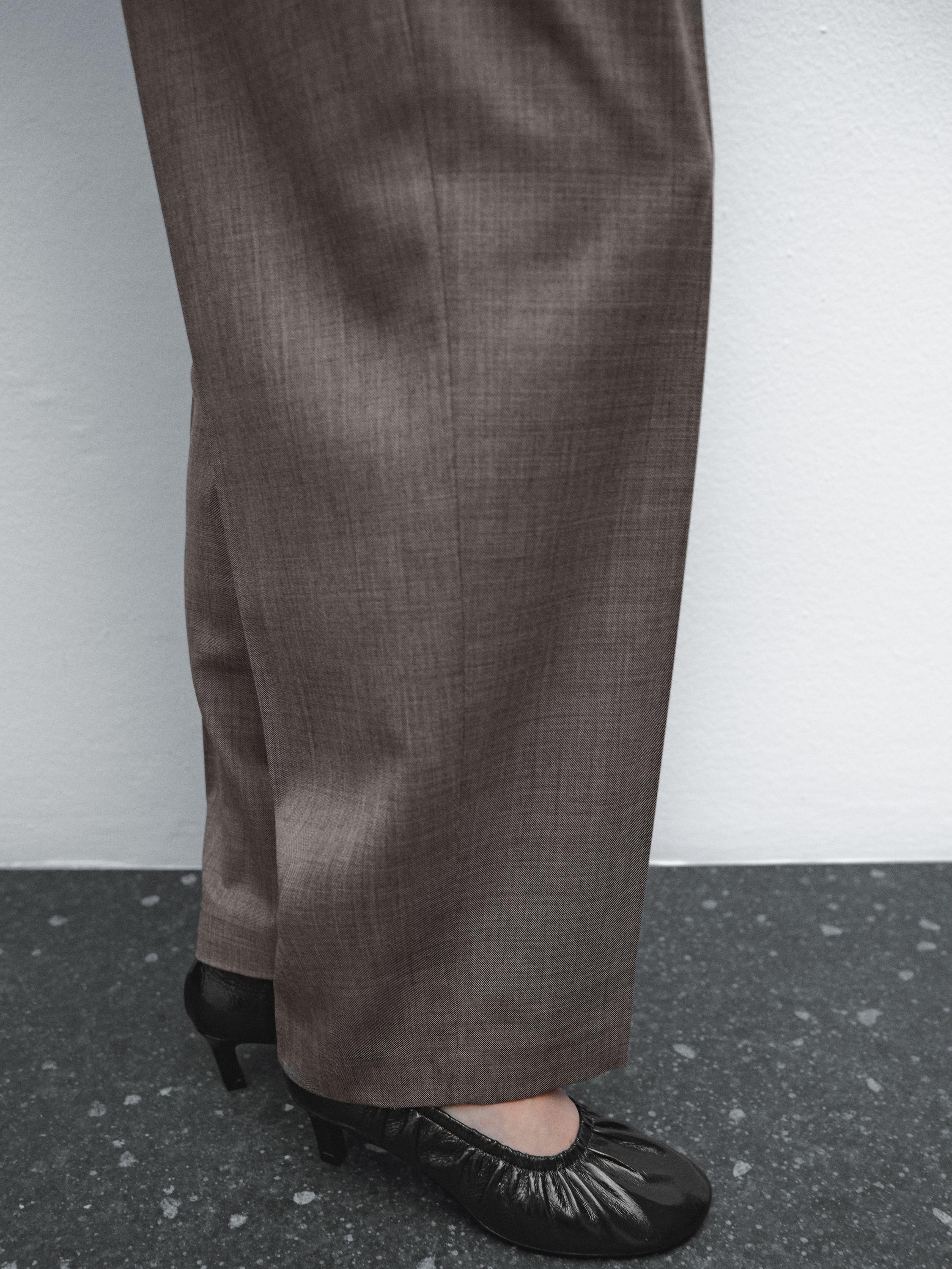 Pantalon chiné plissé en laine mélangée