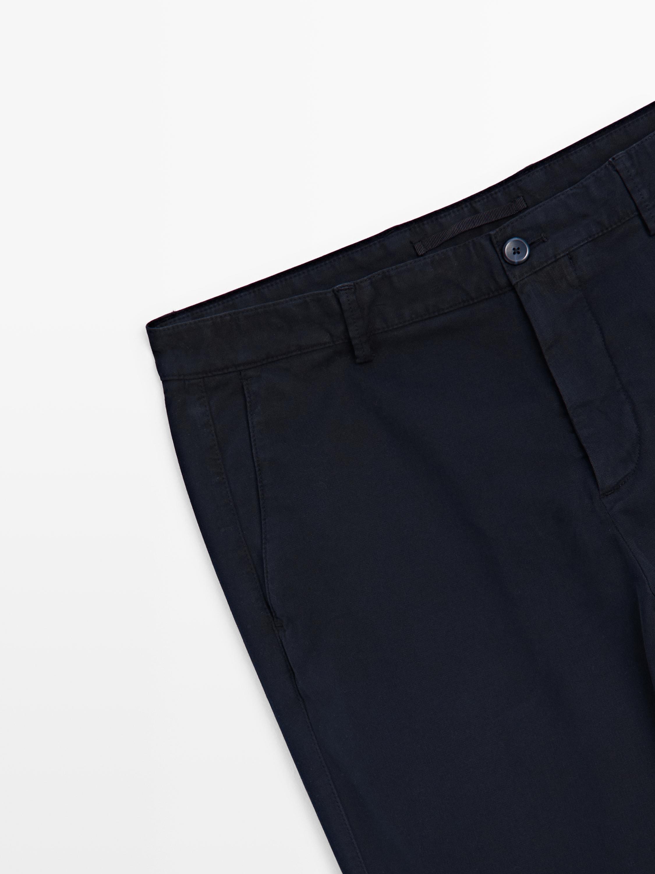 Slim-fit micro-textured trousers — NAVY BLUE