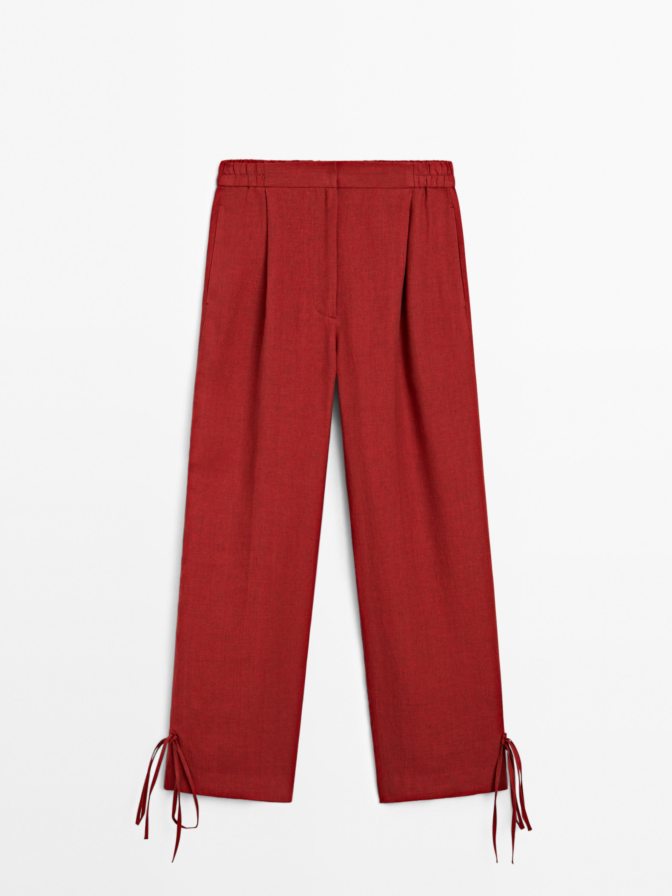 Spodnie ze 100% lnu z troczkami