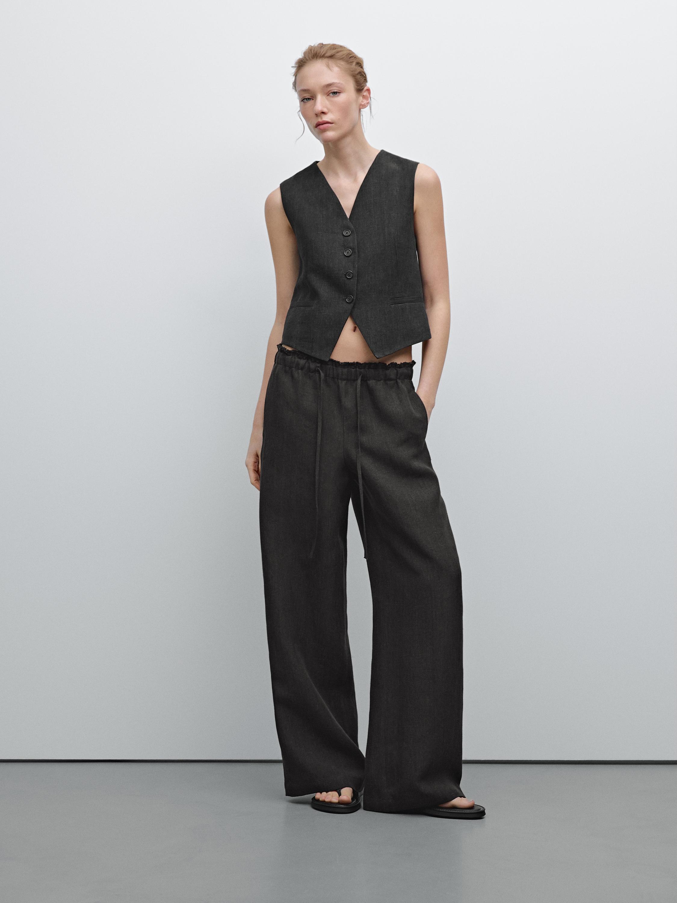 Linen suit trousers with frayed detail