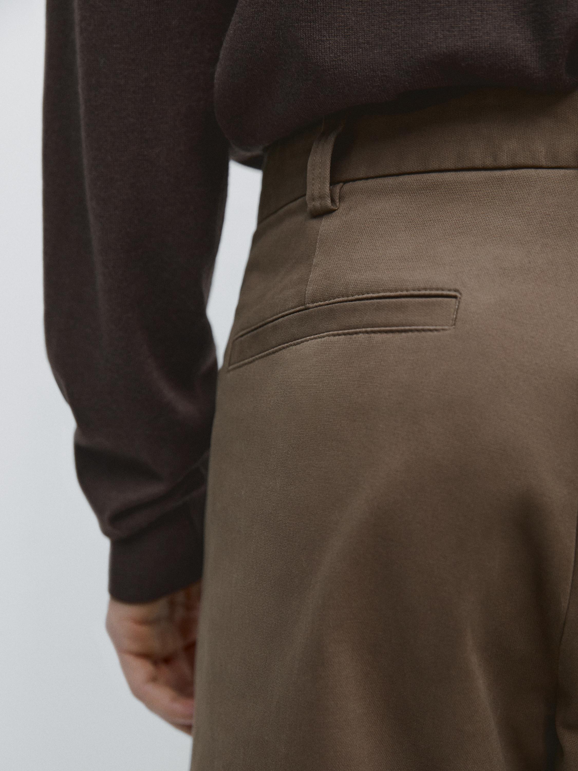 Tapered fit micro textured trousers — MINK