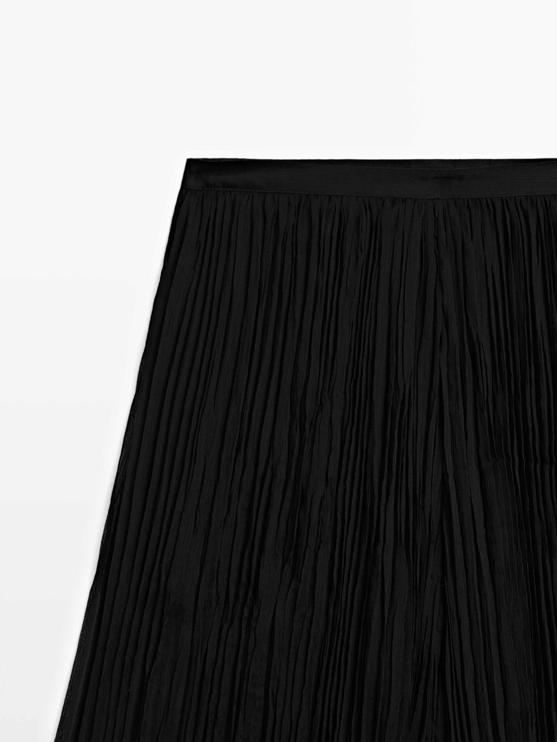 Pantalón ancho plisado