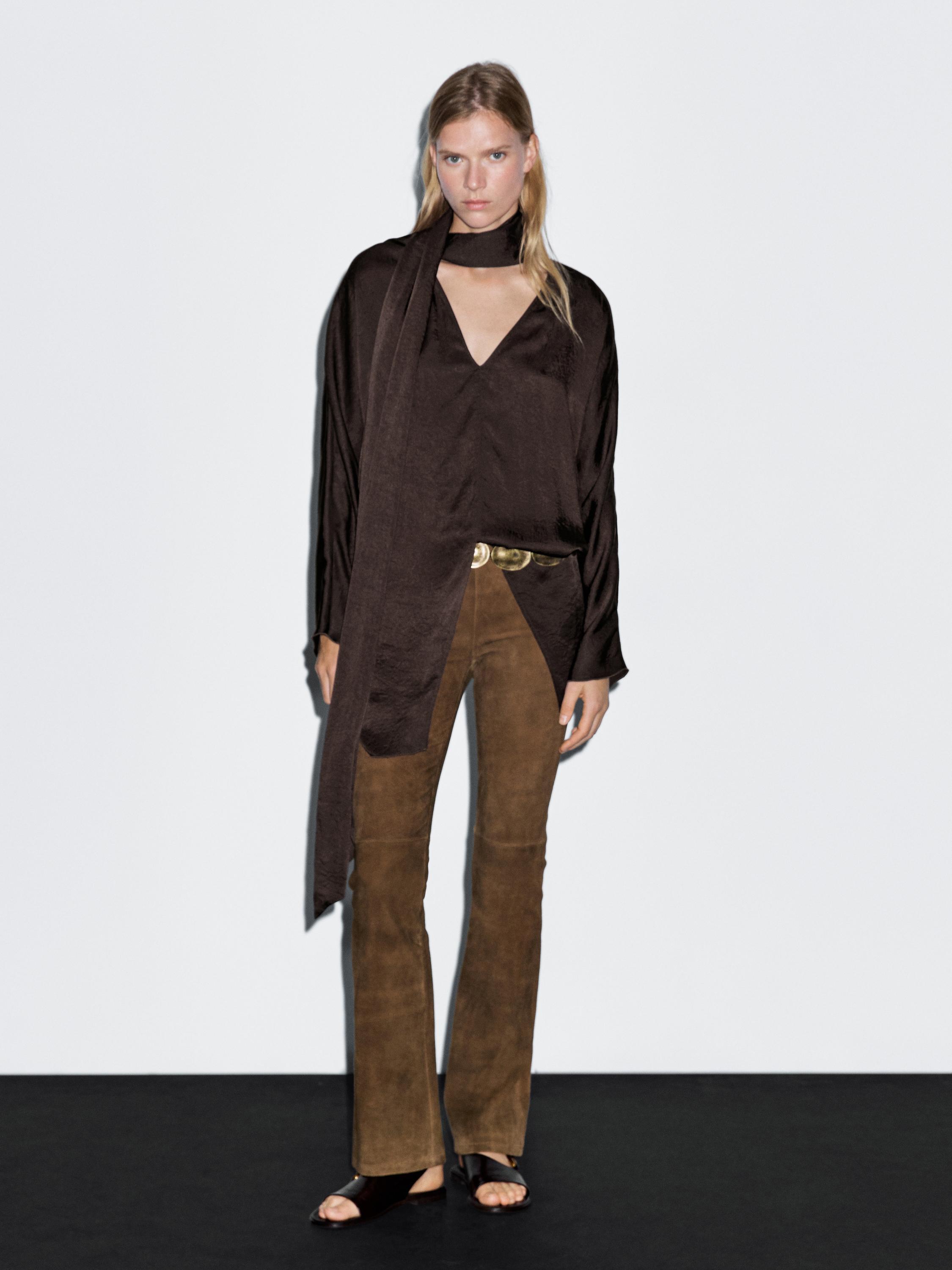 Long flowing blouse with tied neck