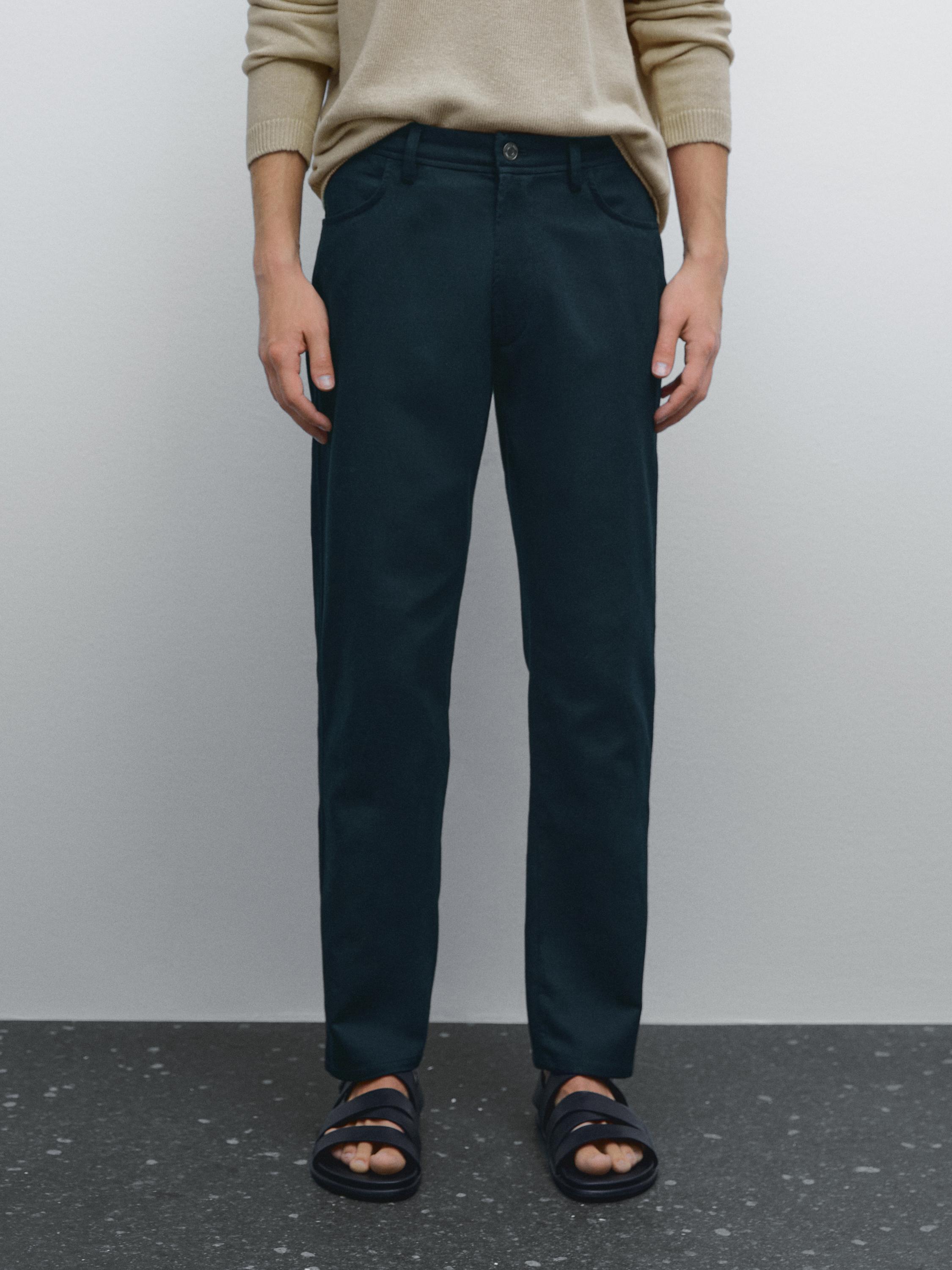 Cotton blend tapered fit denim trousers
