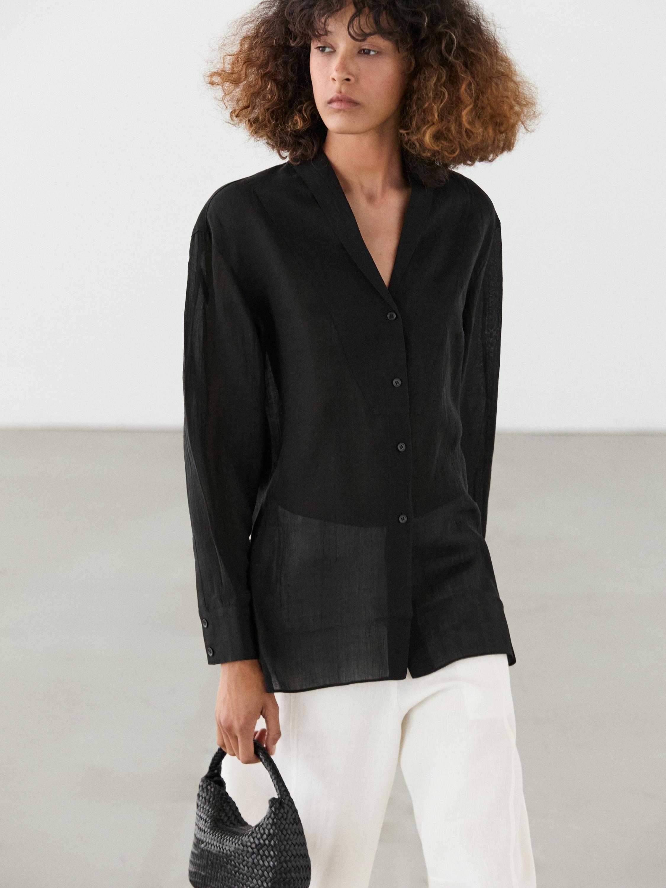 Flowing semi-sheer shirt with chest detail — BLACK