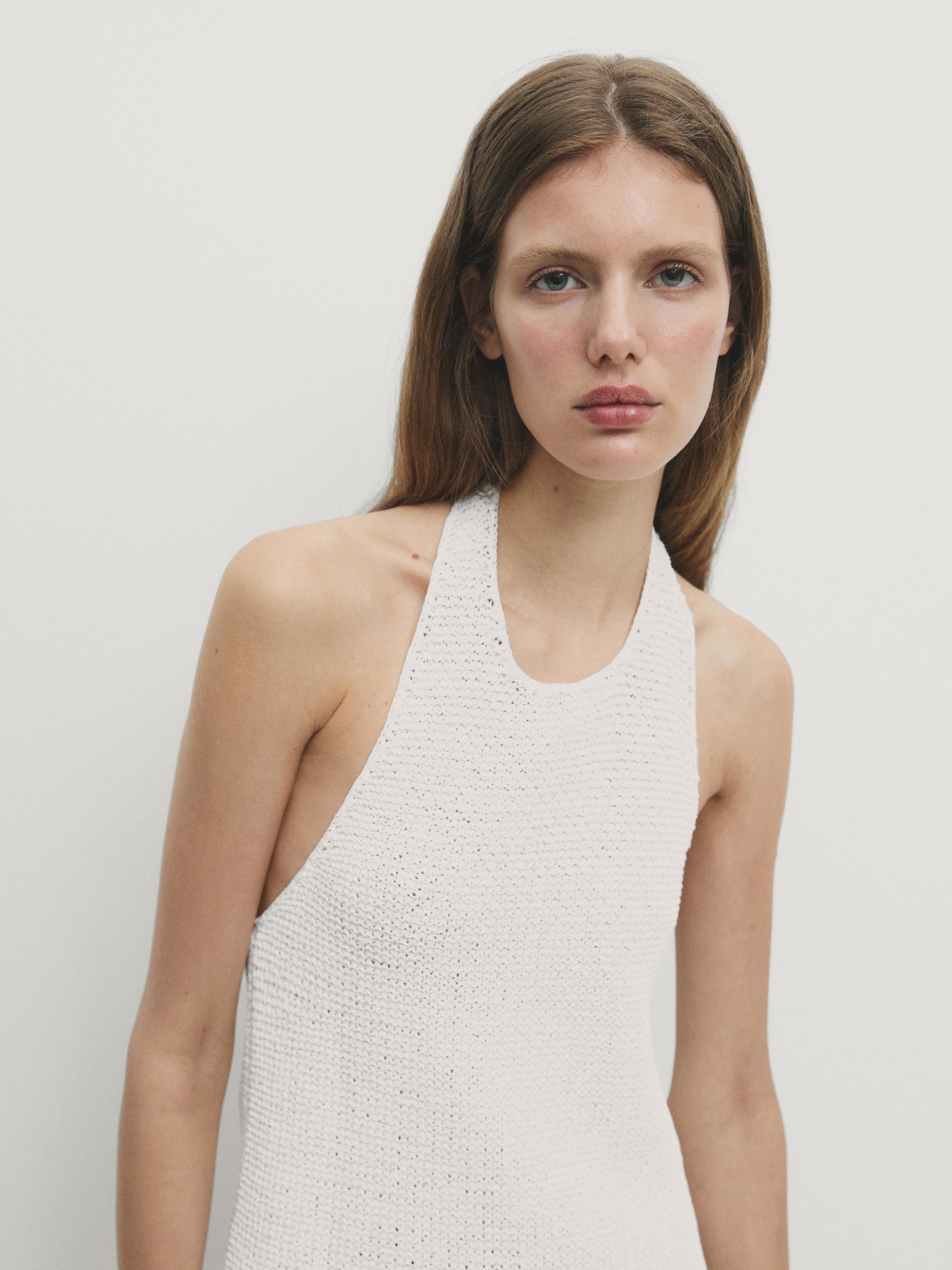 Halterneck top with low-cut back
