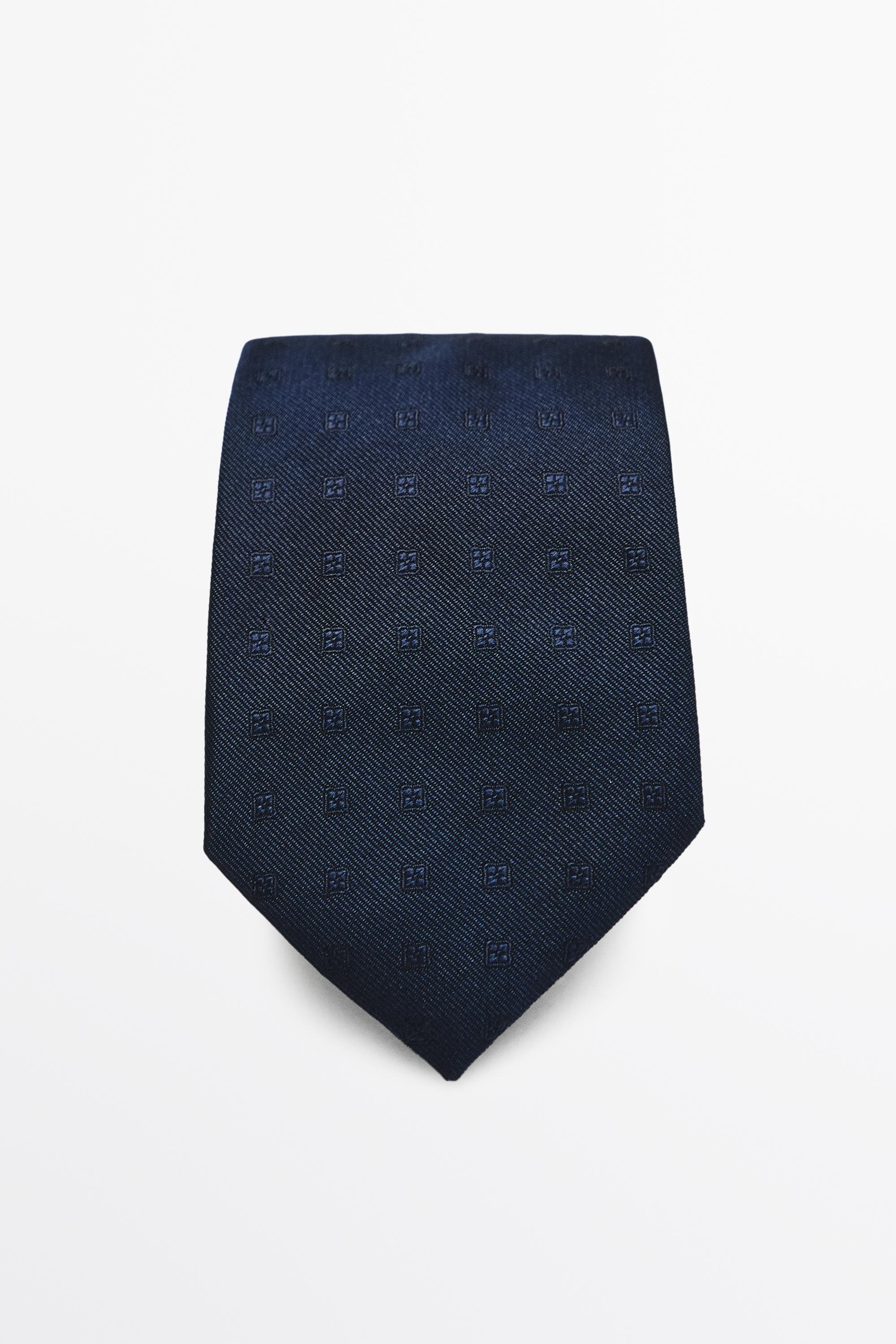 100% silk tie with embroidered detail