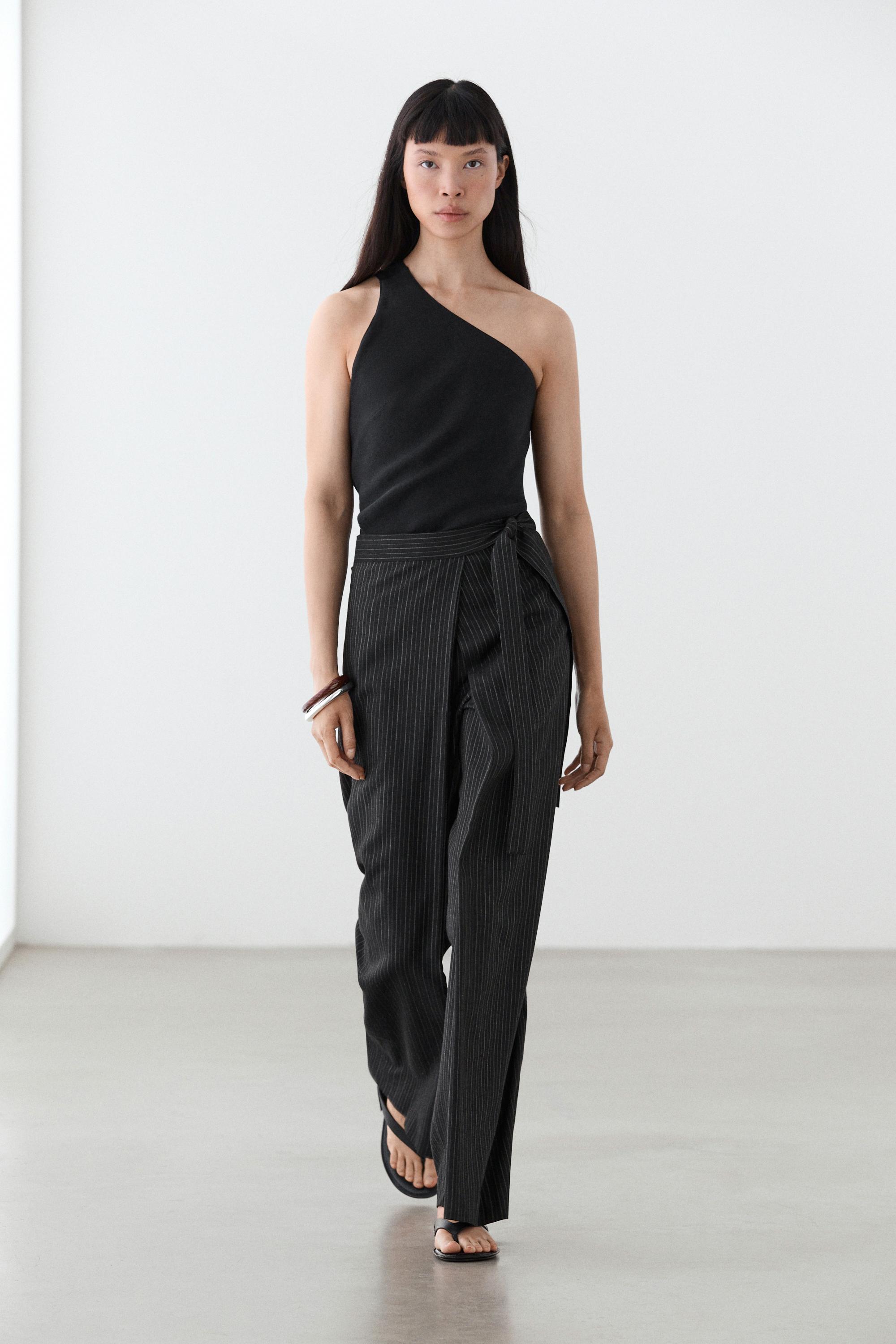 Asymmetric linen blend top with back detail — BLACK