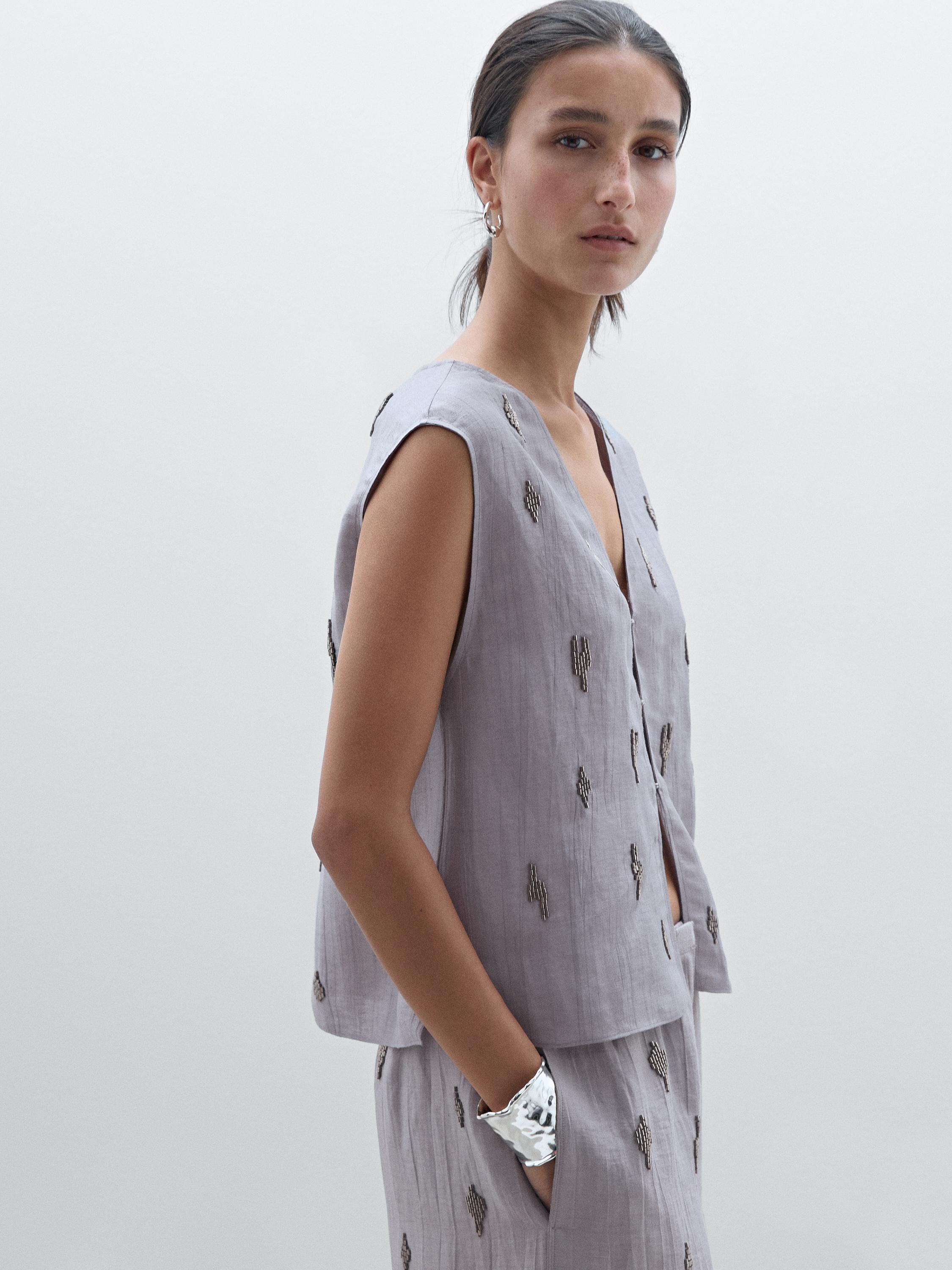 100% linen top with rhinestone detail