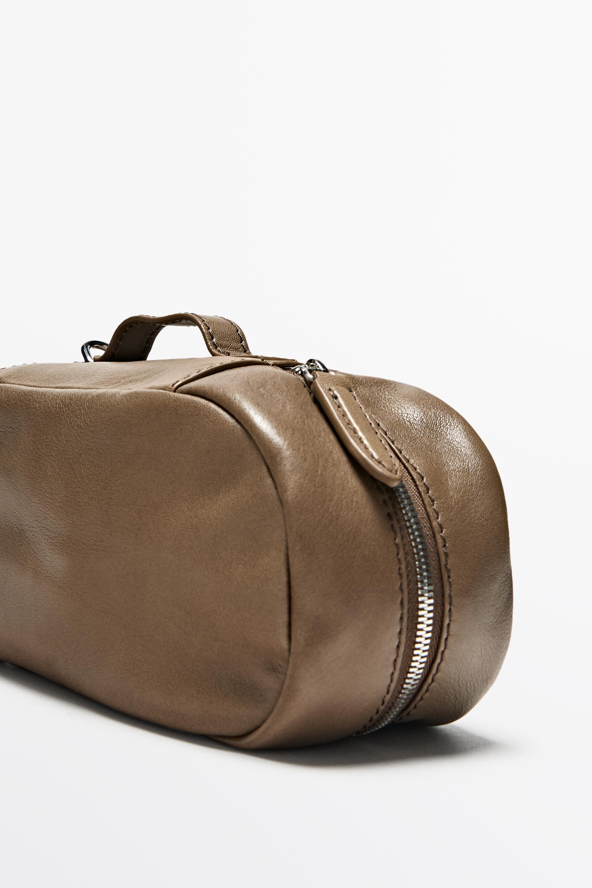 Oval nappa leather toiletry bag — MOLE BROWN