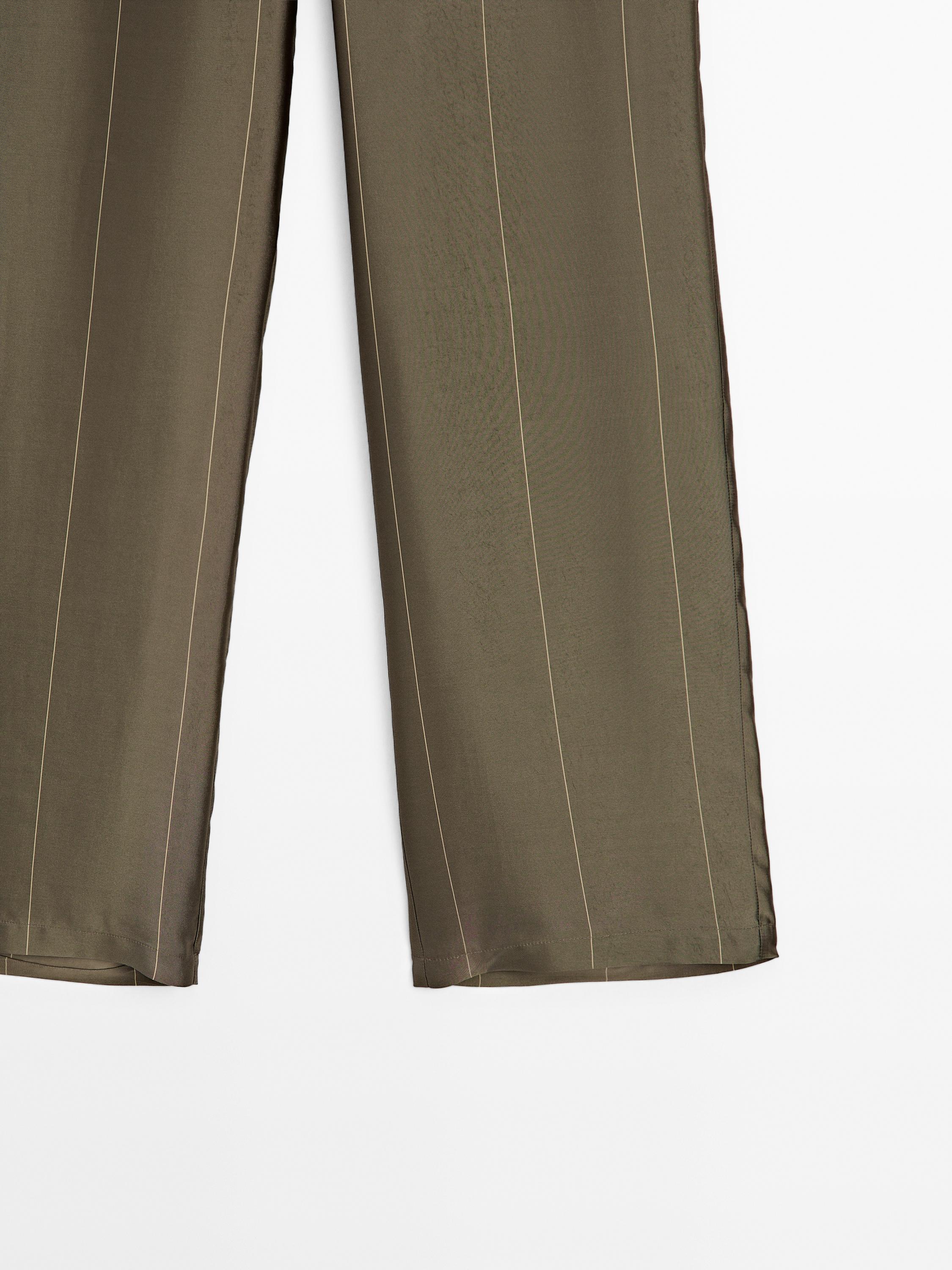 Flowing trousers with striped details