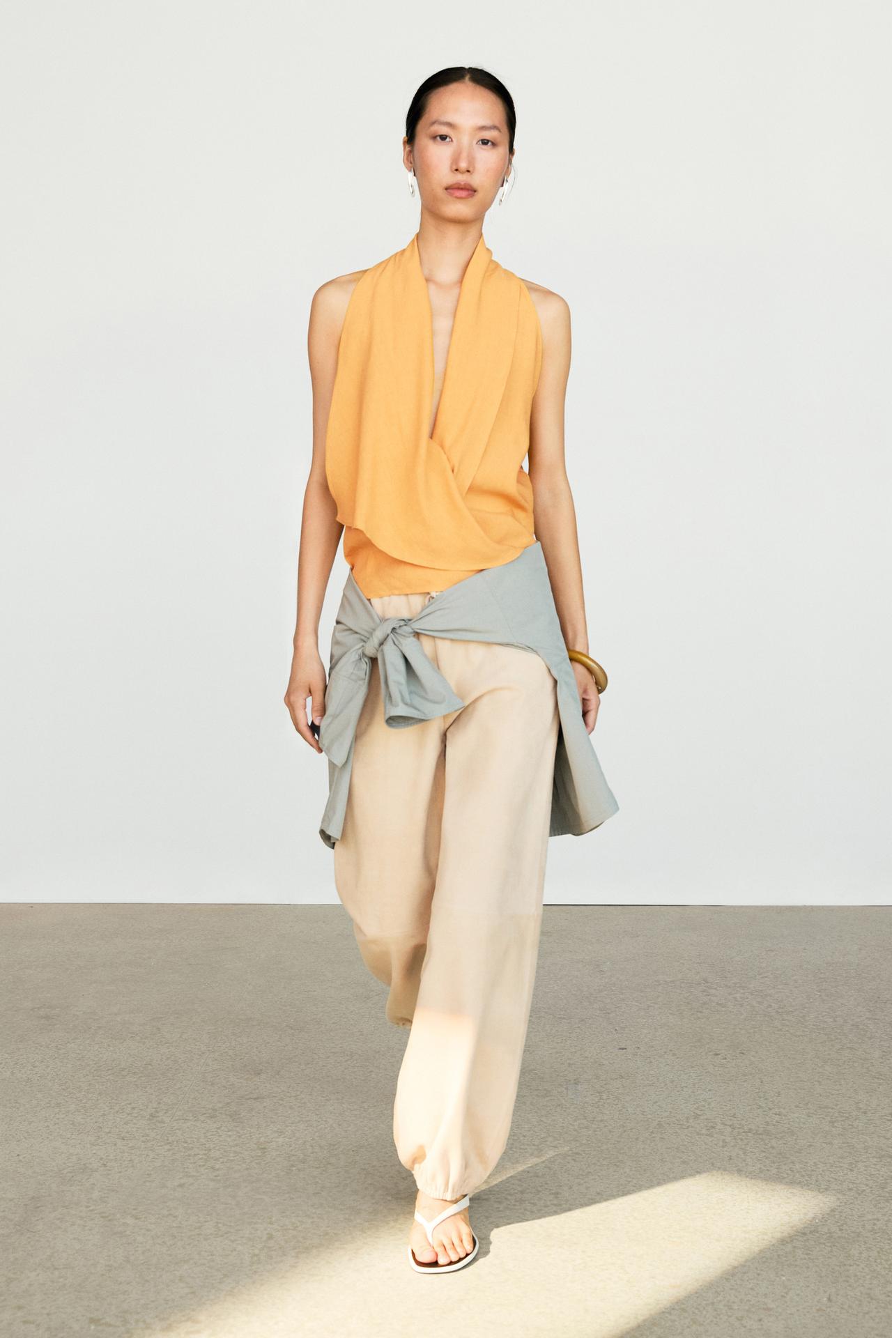 Flowing halter top with ruffle detail — YELLOW