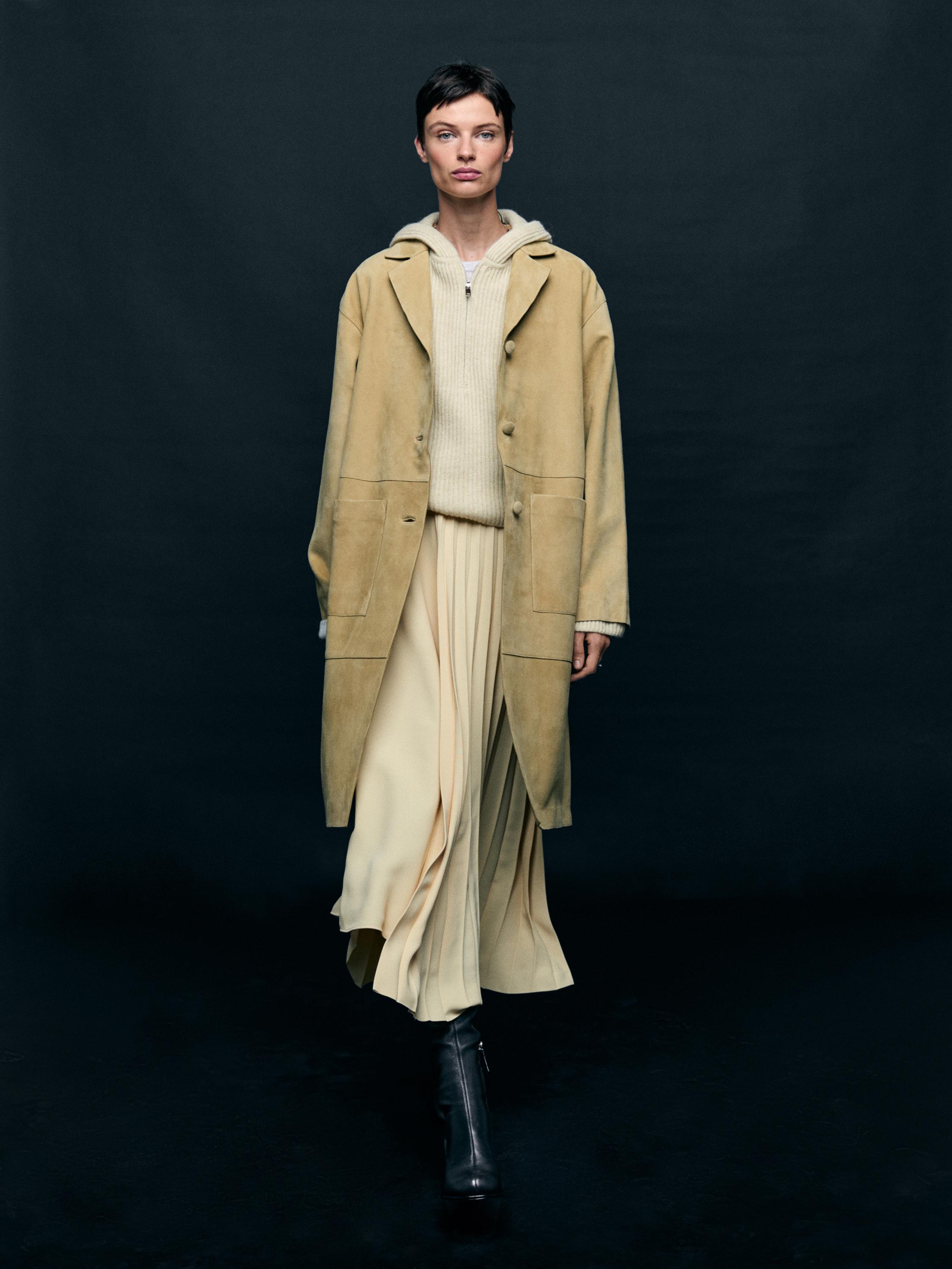 Wool blend sweater with hood detail