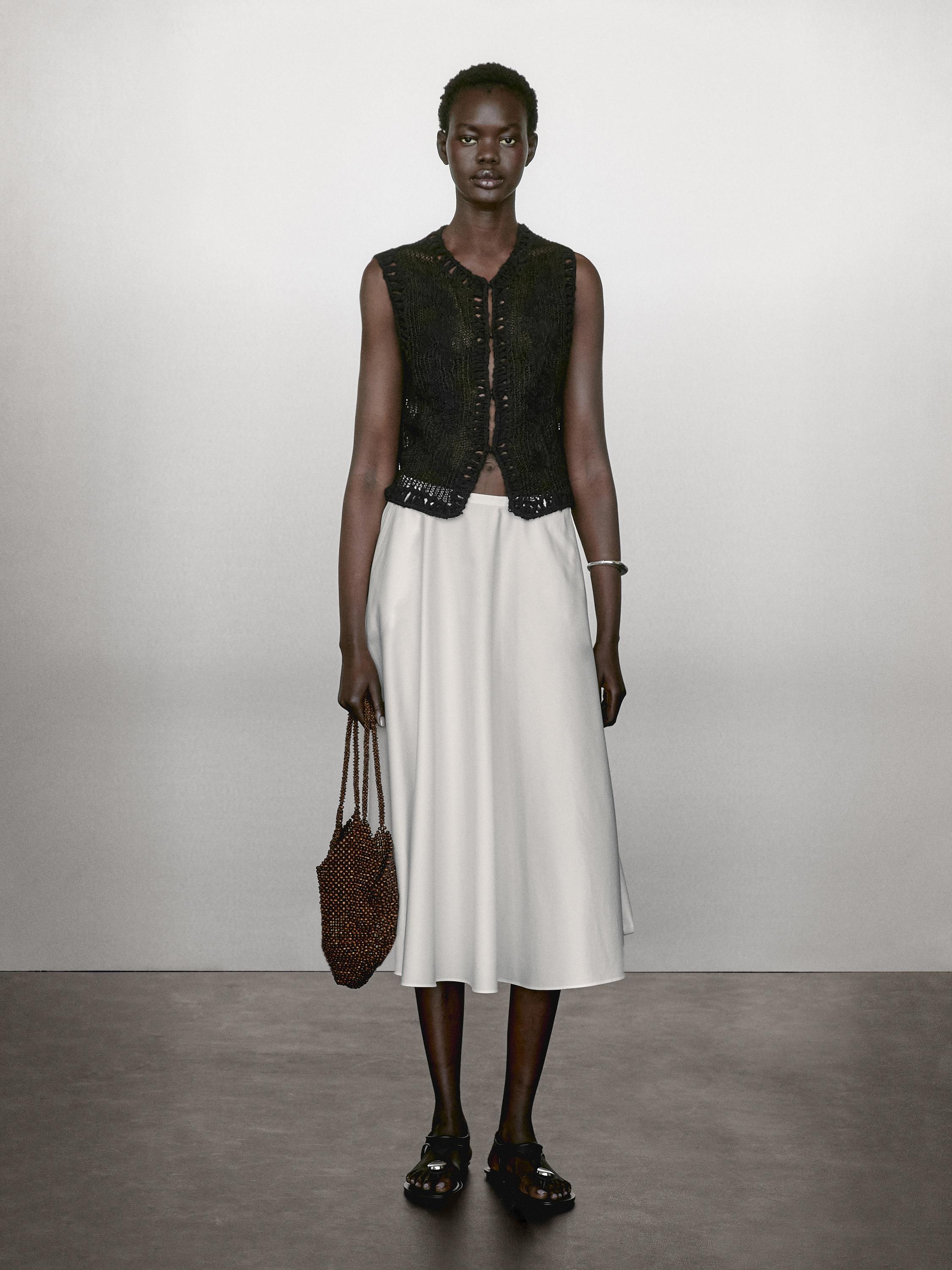 Knit vest with embroidered detail