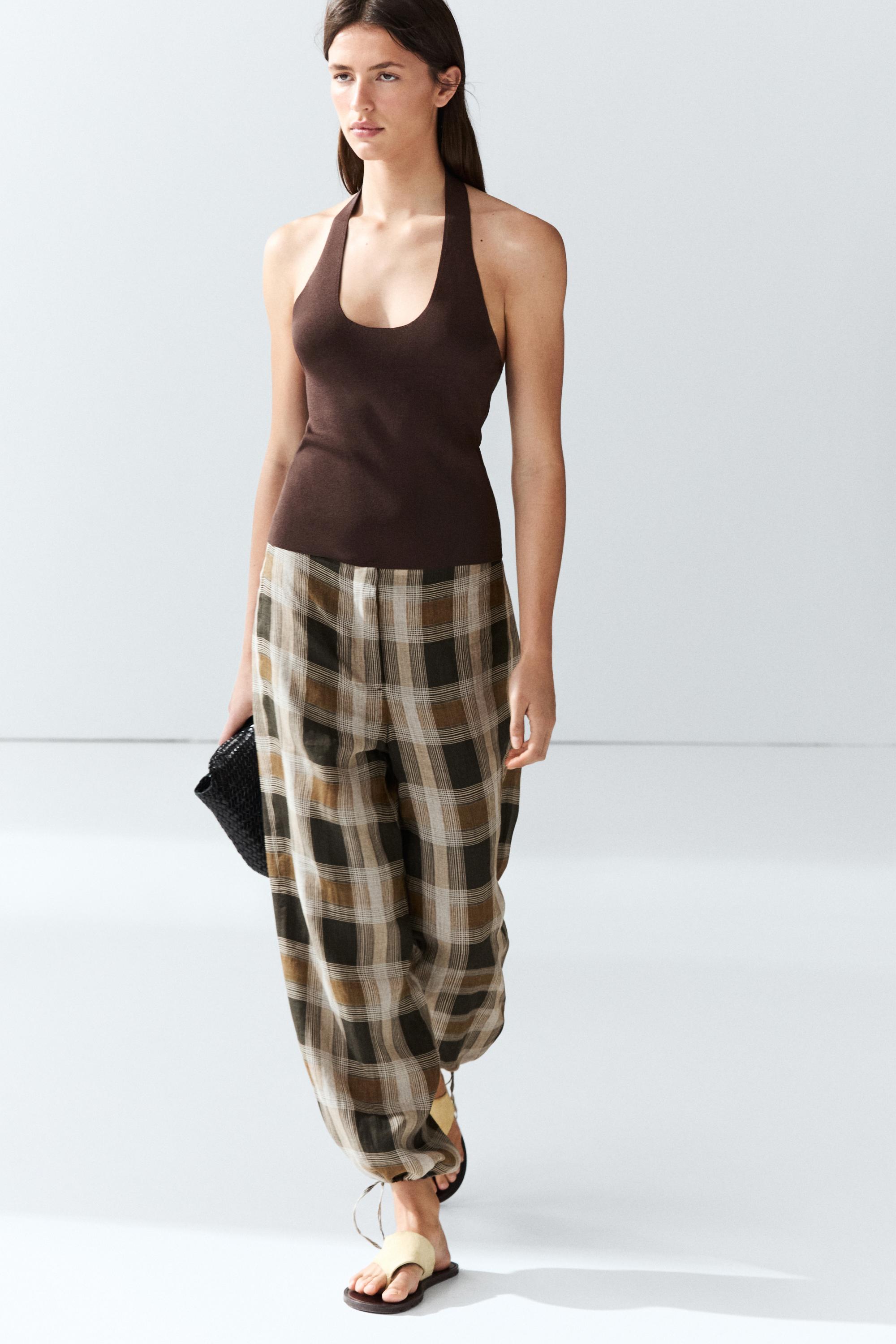 Check print sarouel trousers — BLACK