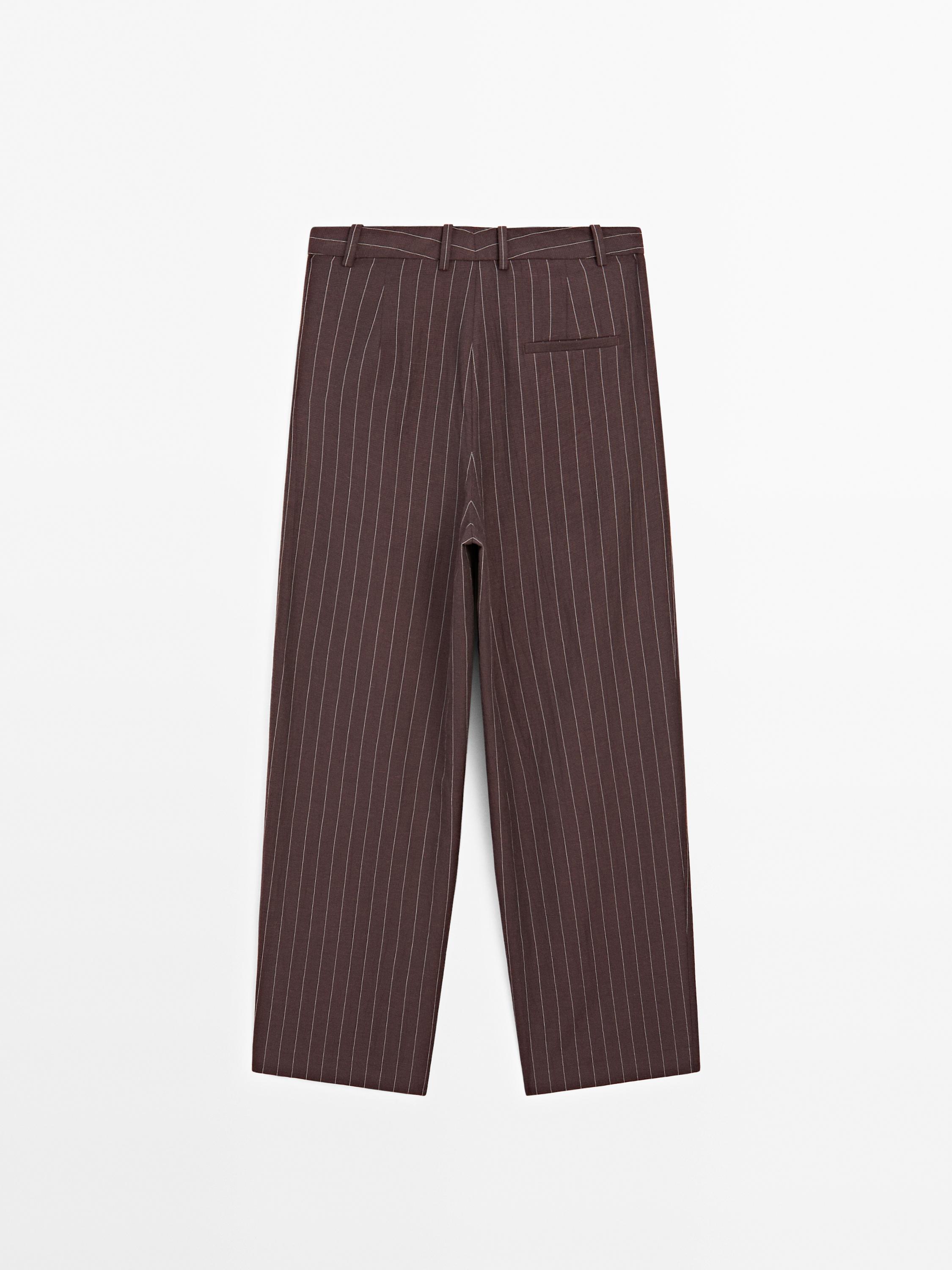 Darted pinstripe trousers