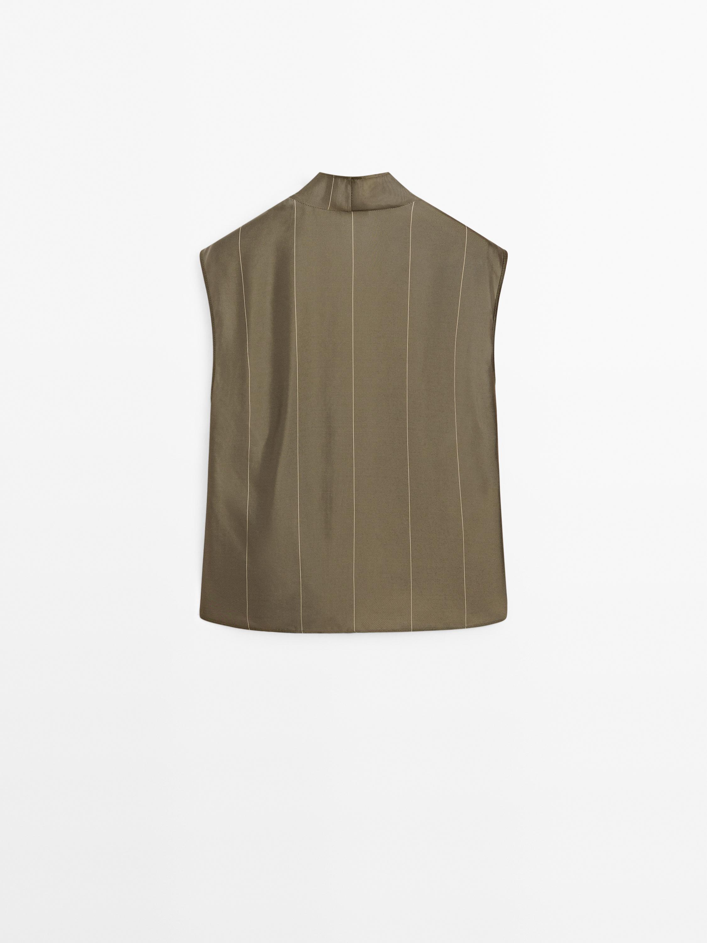 Flowing blouse with striped details