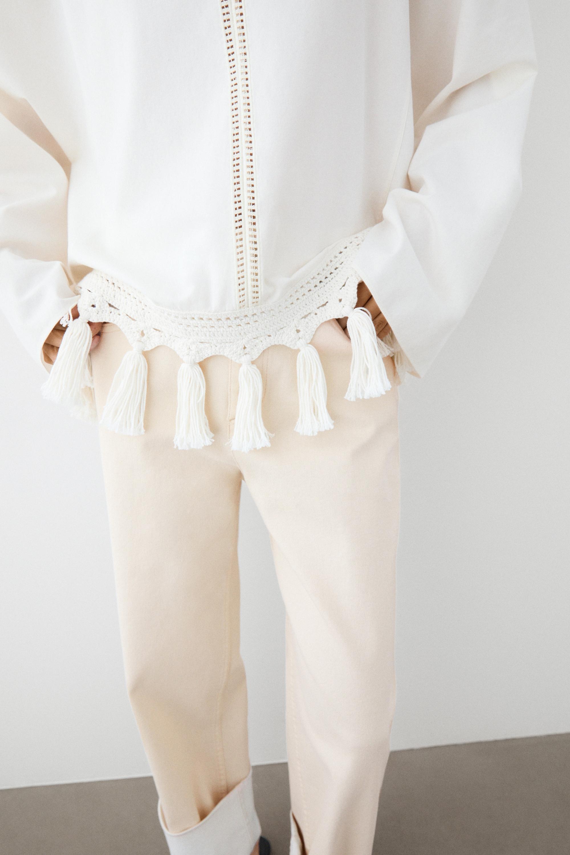 Embroidered blouse with fringed hem — WHITE