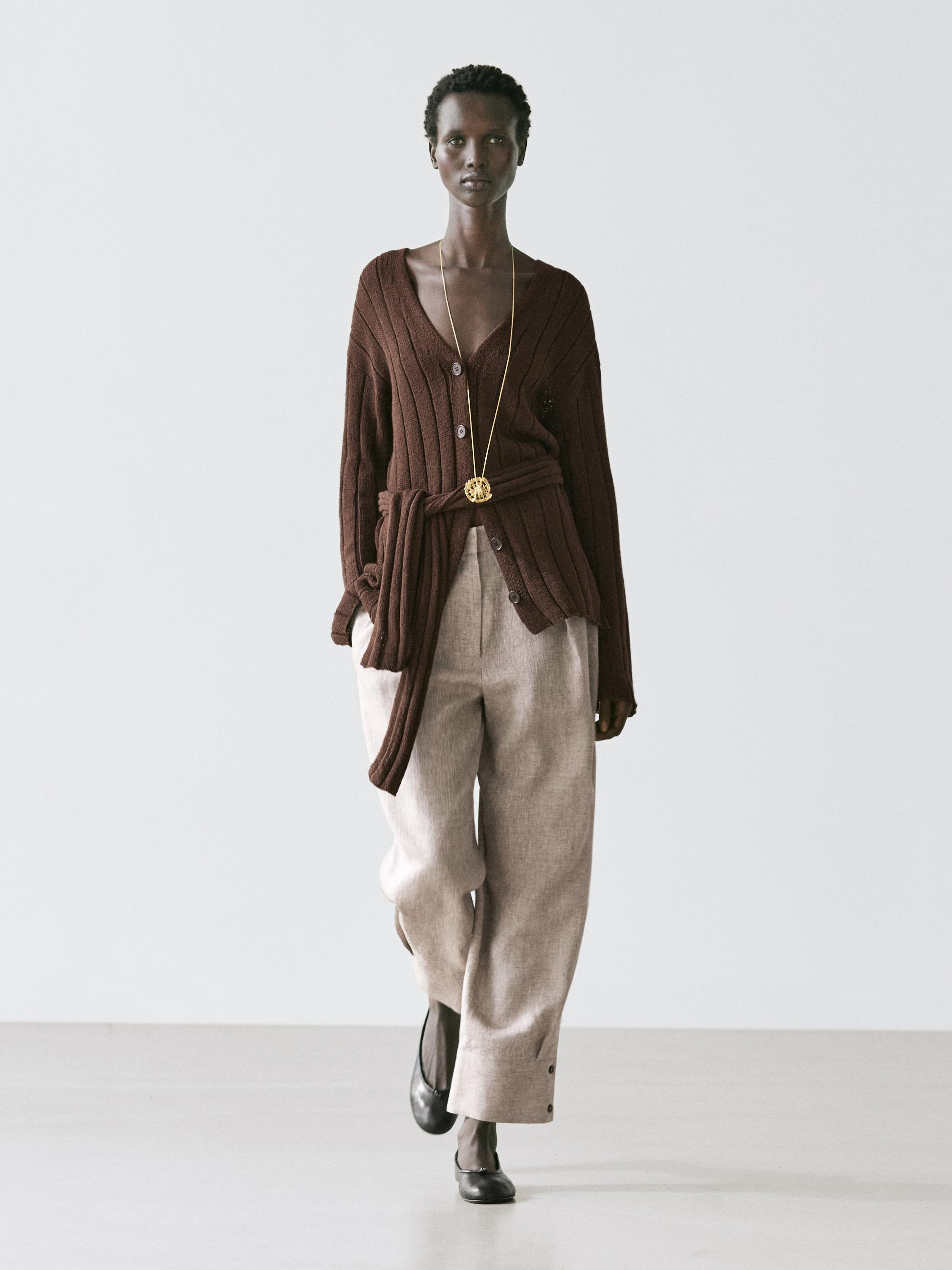 Suit trousers with buckle detail