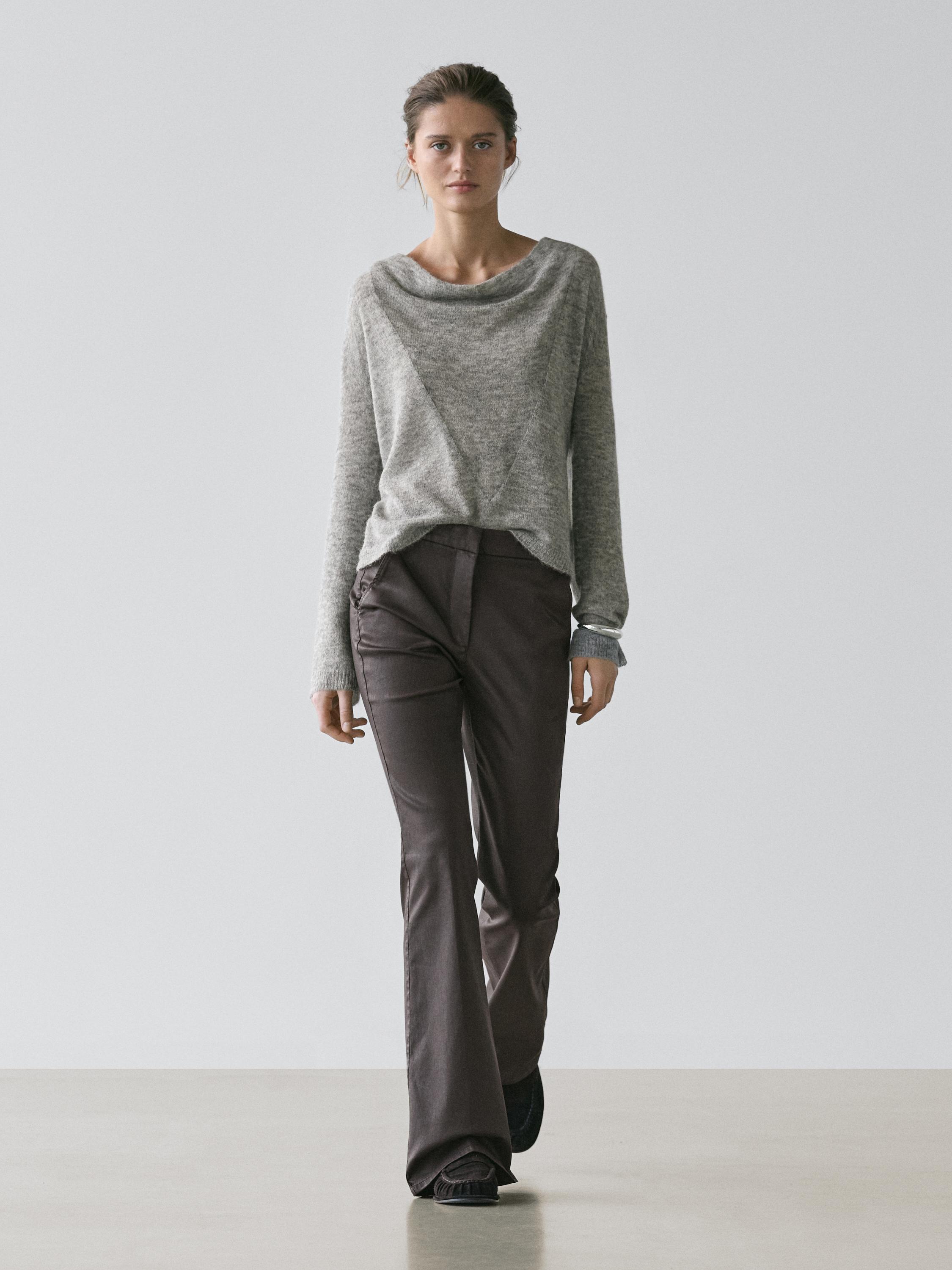 Coated flared trousers