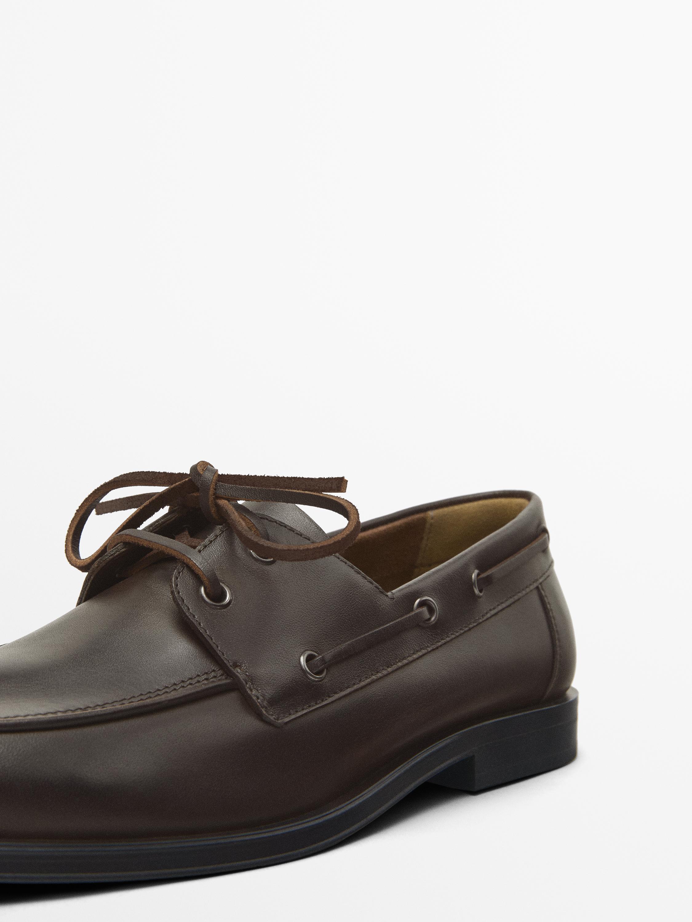 Brown leather deck shoes