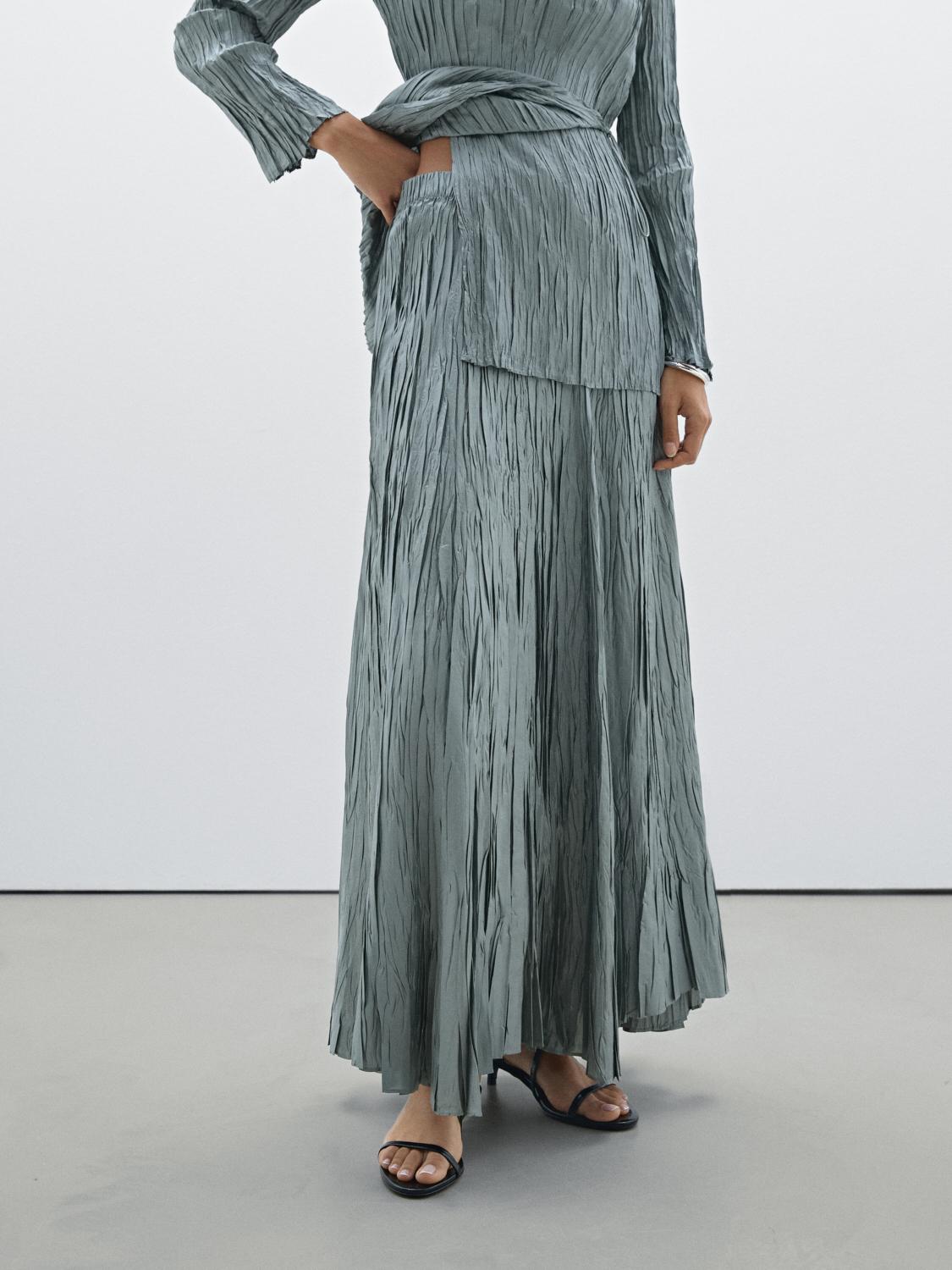 Long pleated skirt with elasticated waistband