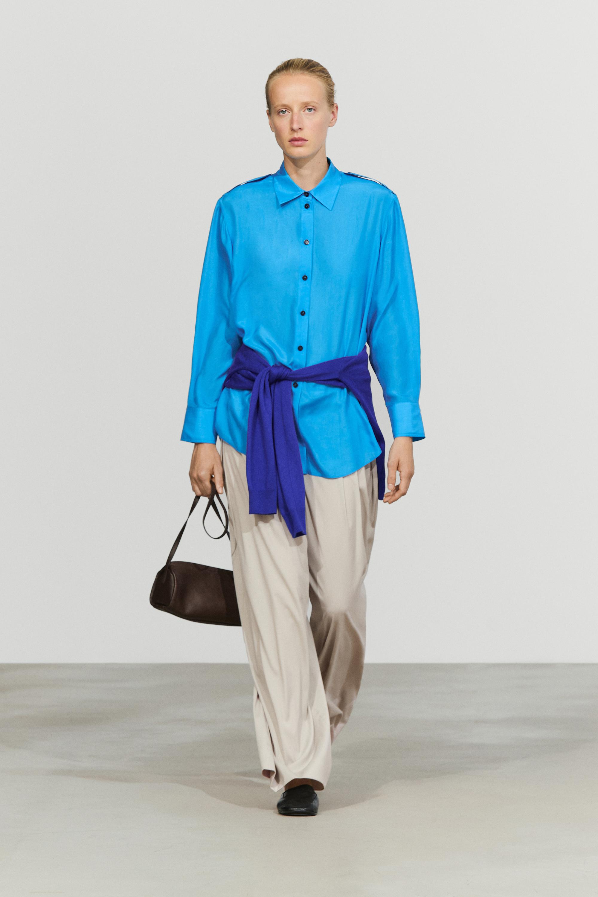 Flowing 100% silk shirt with shoulder detail