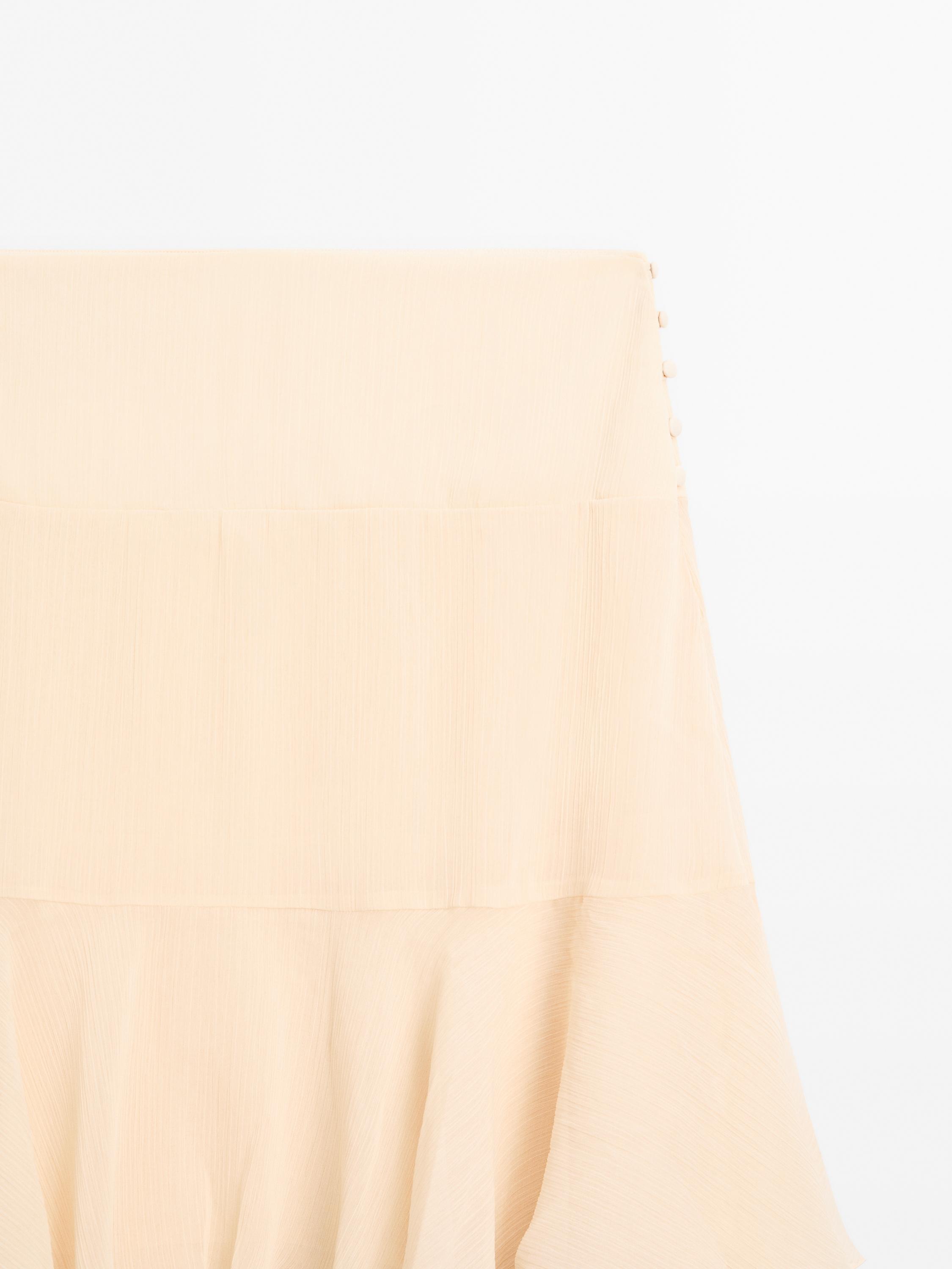 Long ruffled skirt with sash