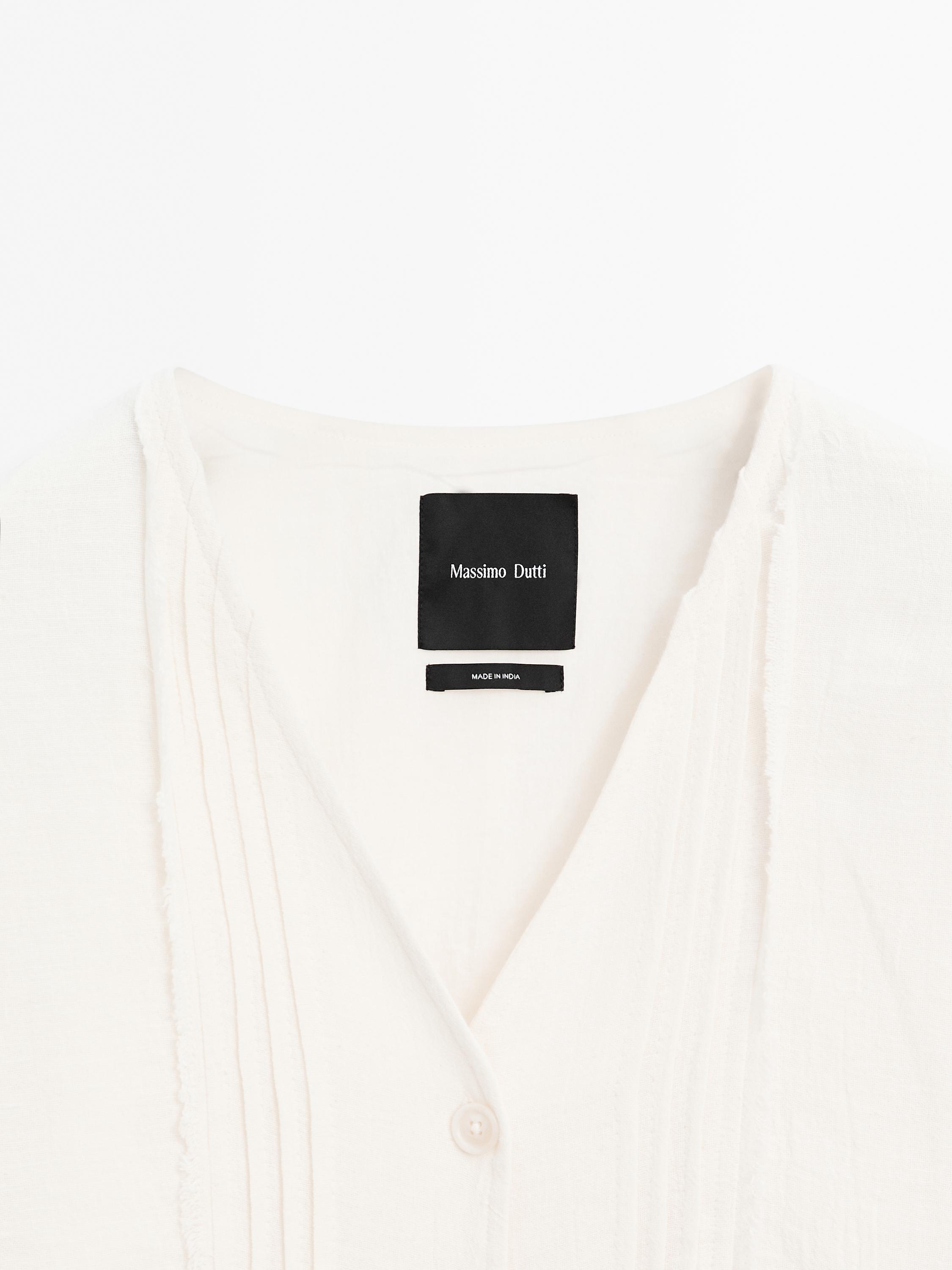 Cotton blend blouse with embroidery