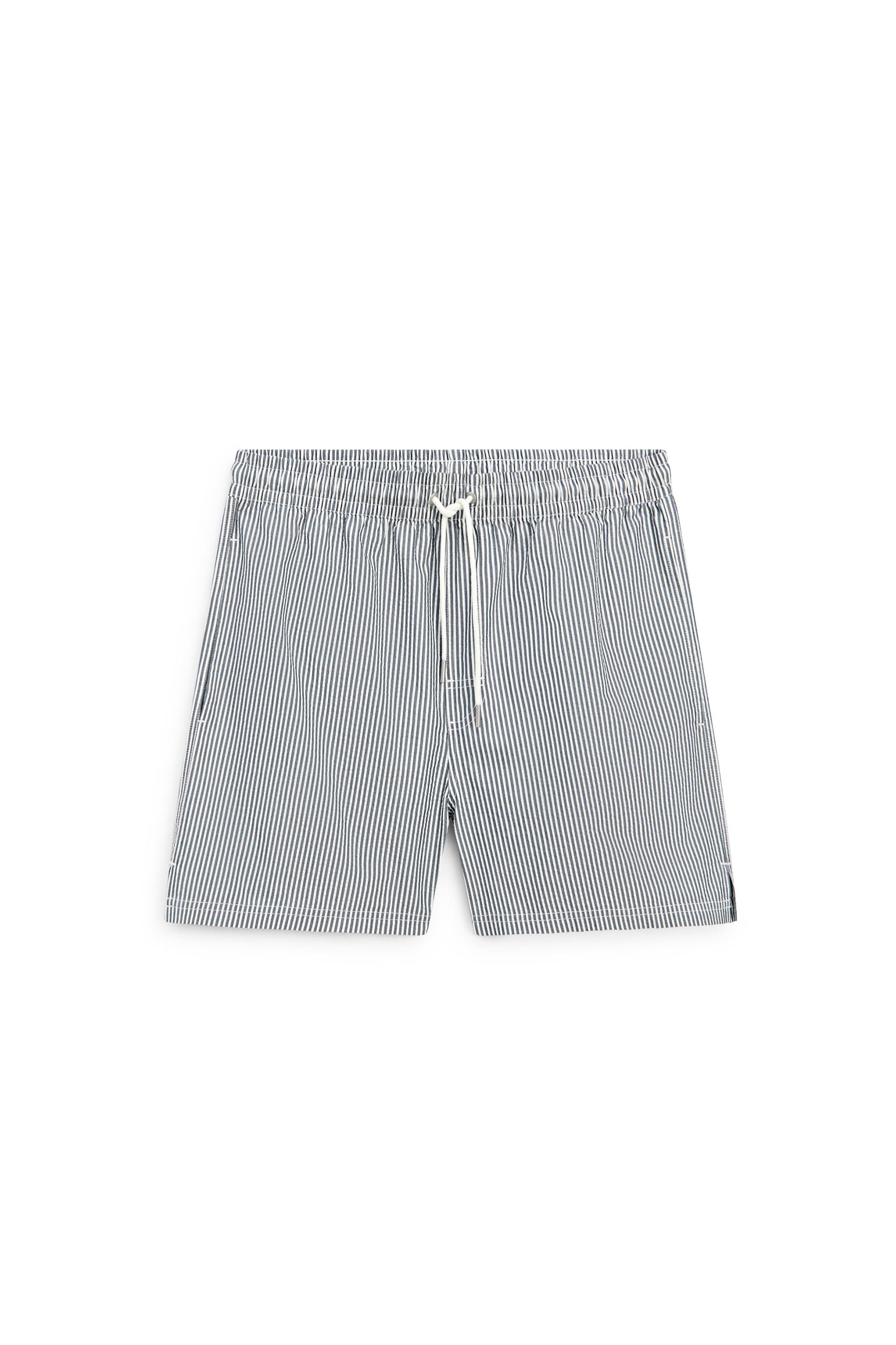 Swimming trunks with striped details — NAVY BLUE