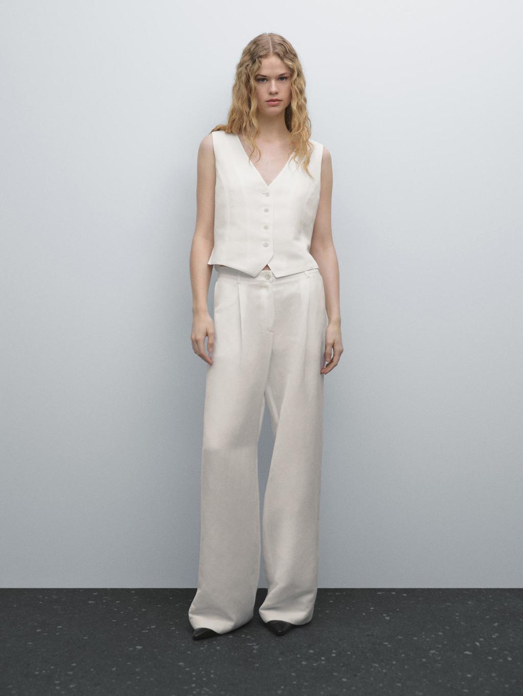 100% linen trousers with sequin pocket