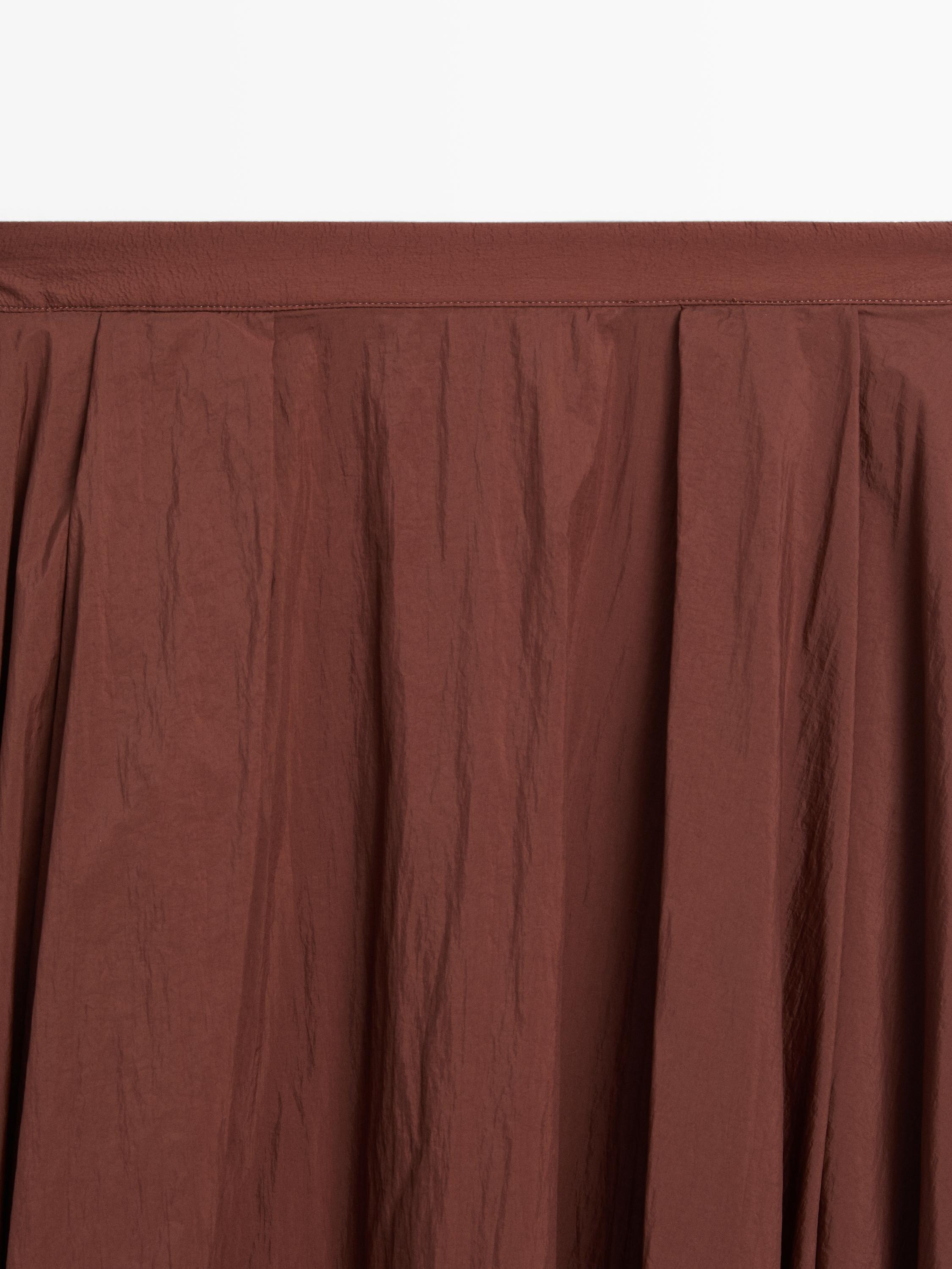 Pleated technical midi skirt