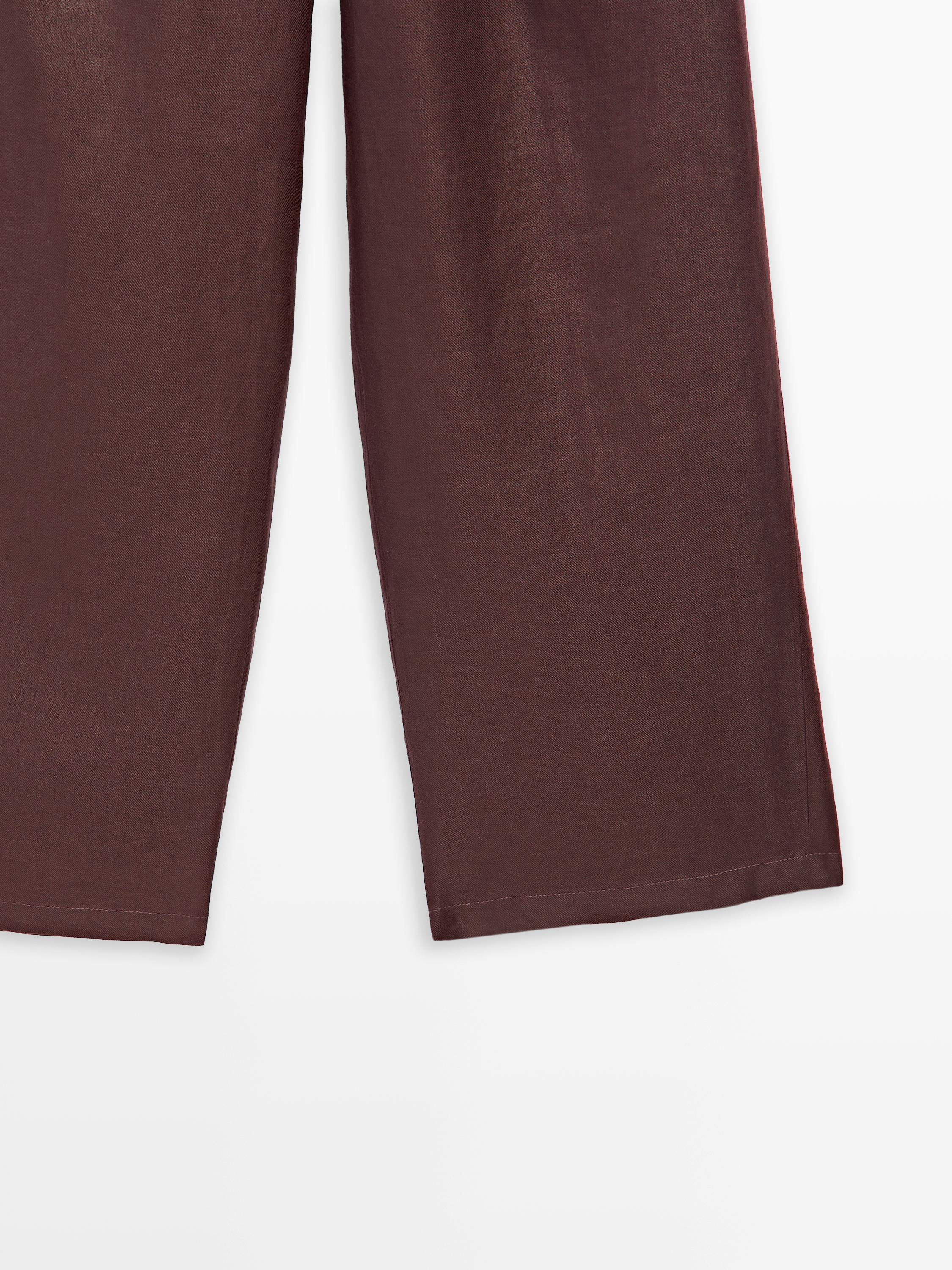 100% linen wide-leg elastic detail trousers