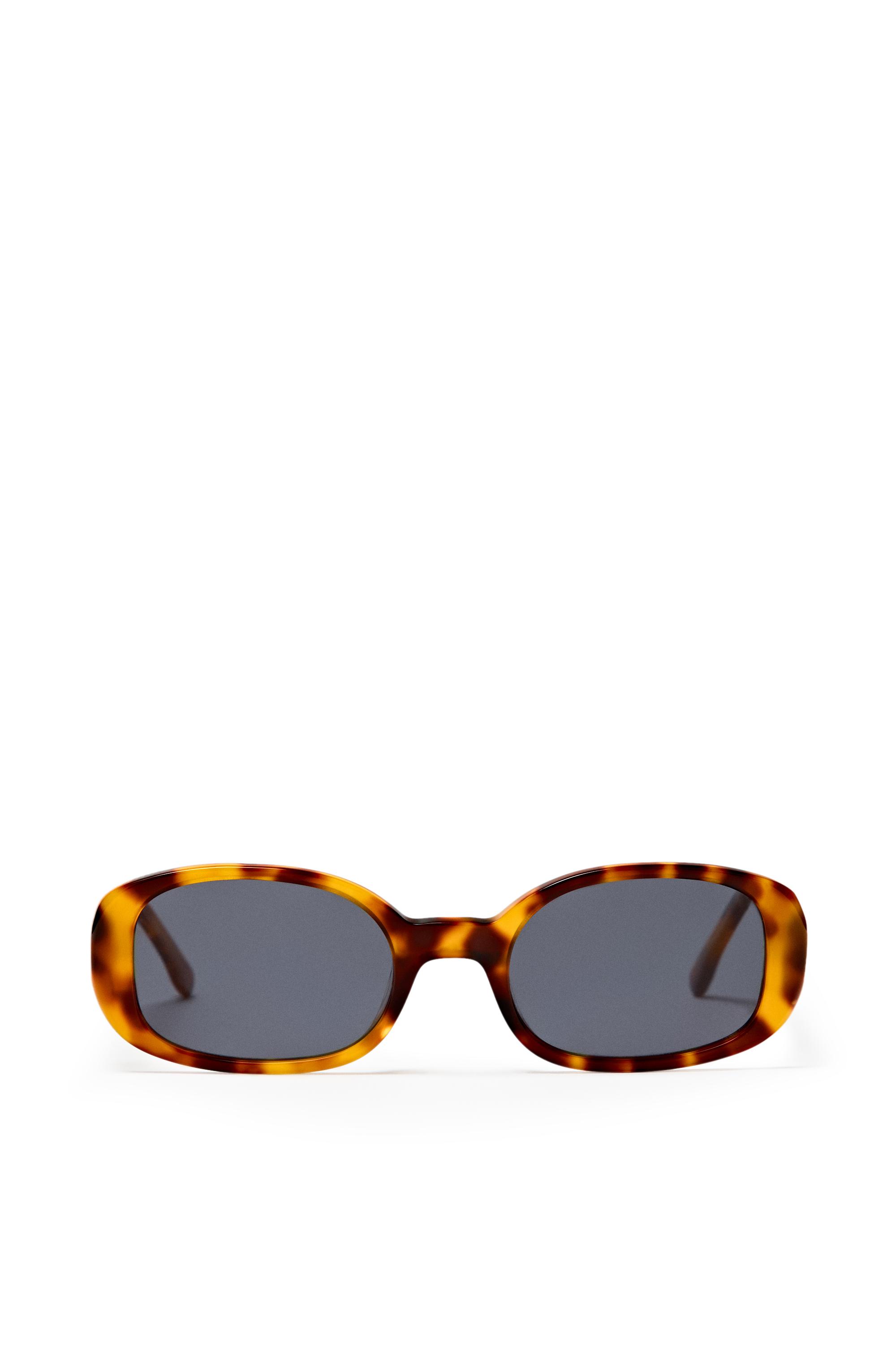 Oval tortoiseshell-effect sunglasses — Light Blue