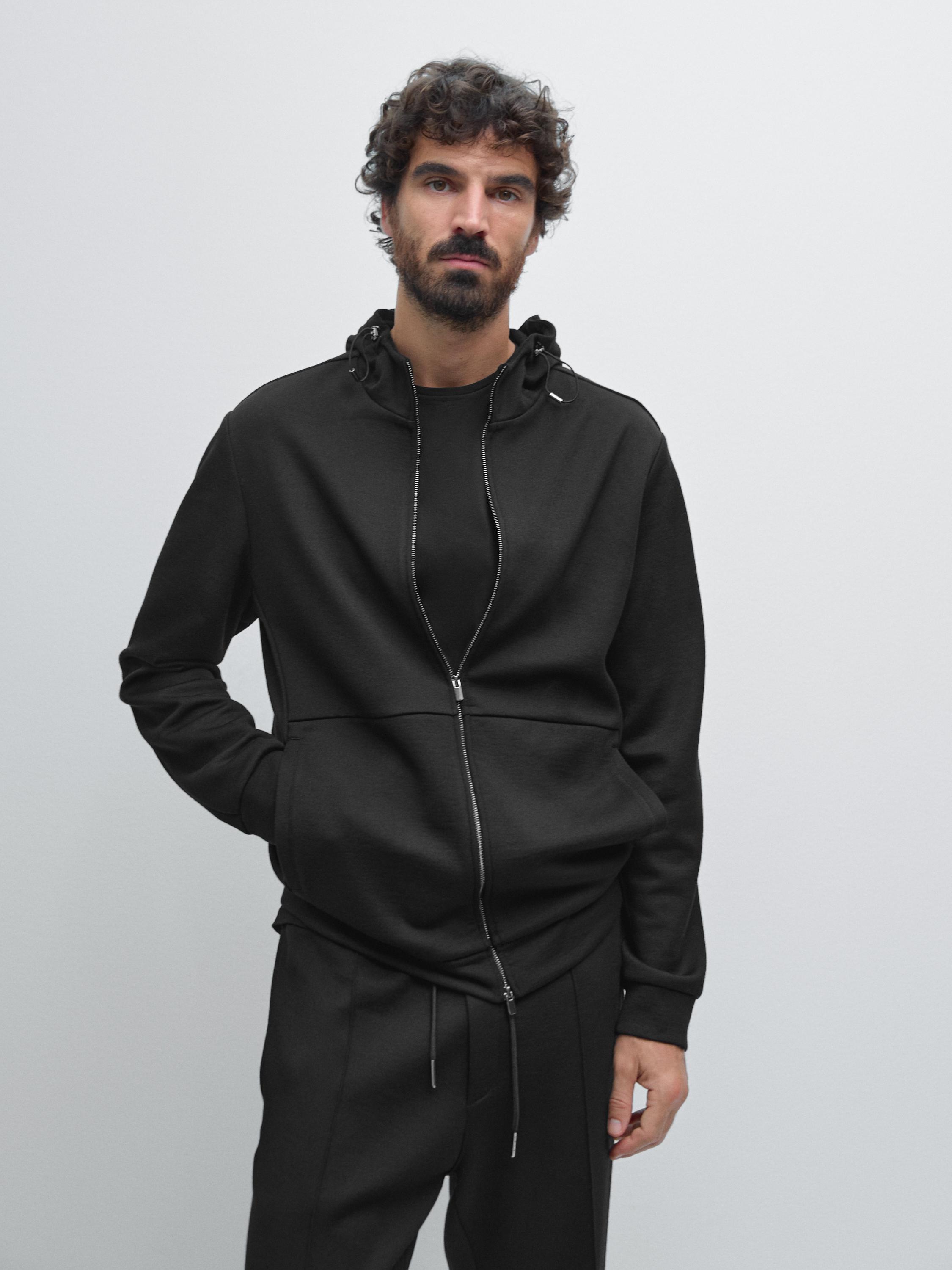 Jogger jacket with adjustable hood