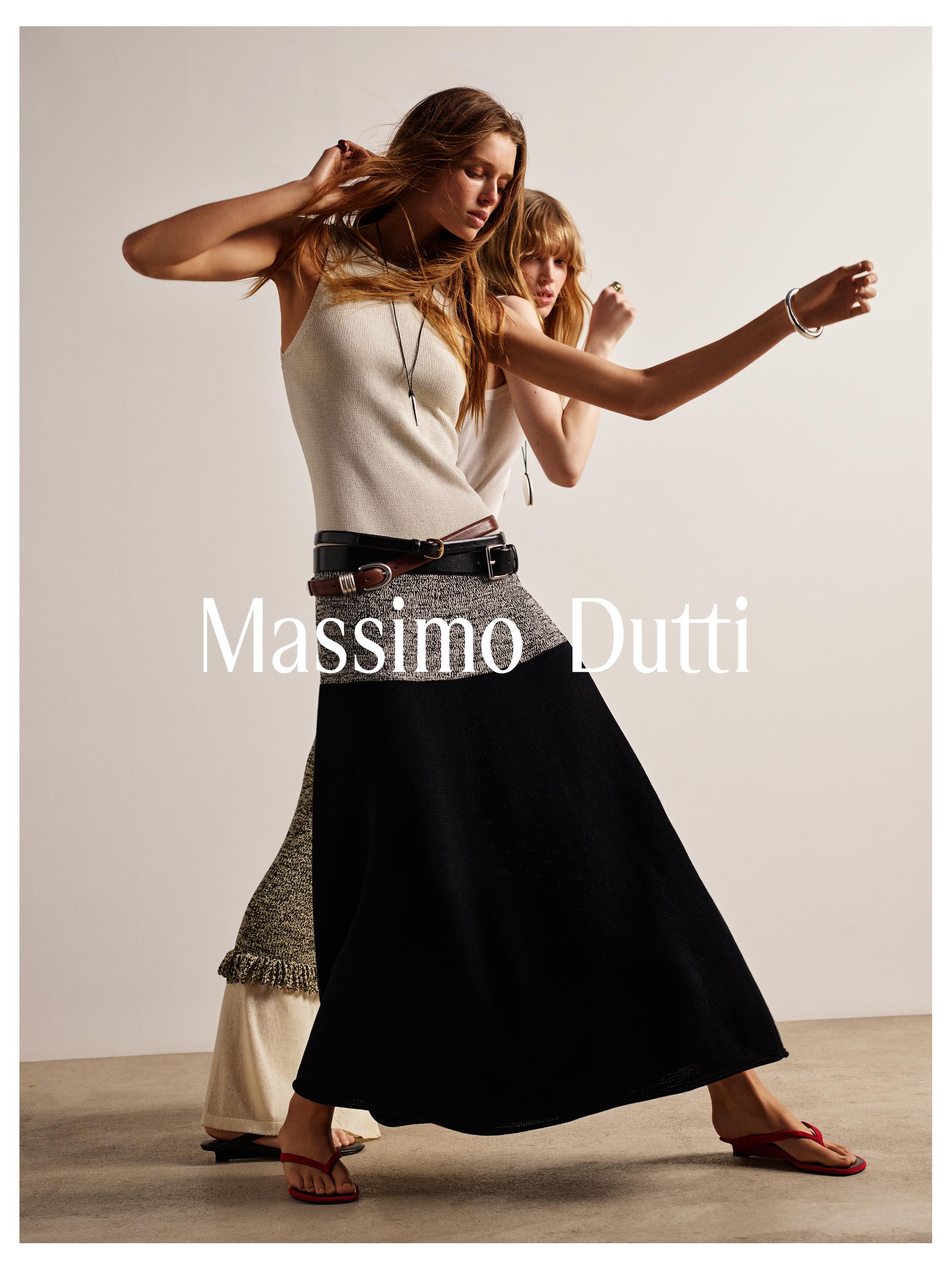 Σετ λευκό αμάνικο τοπ και μαύρη μακριά φούστα με ζώνη. Κείμενο "Massimo Dutti".