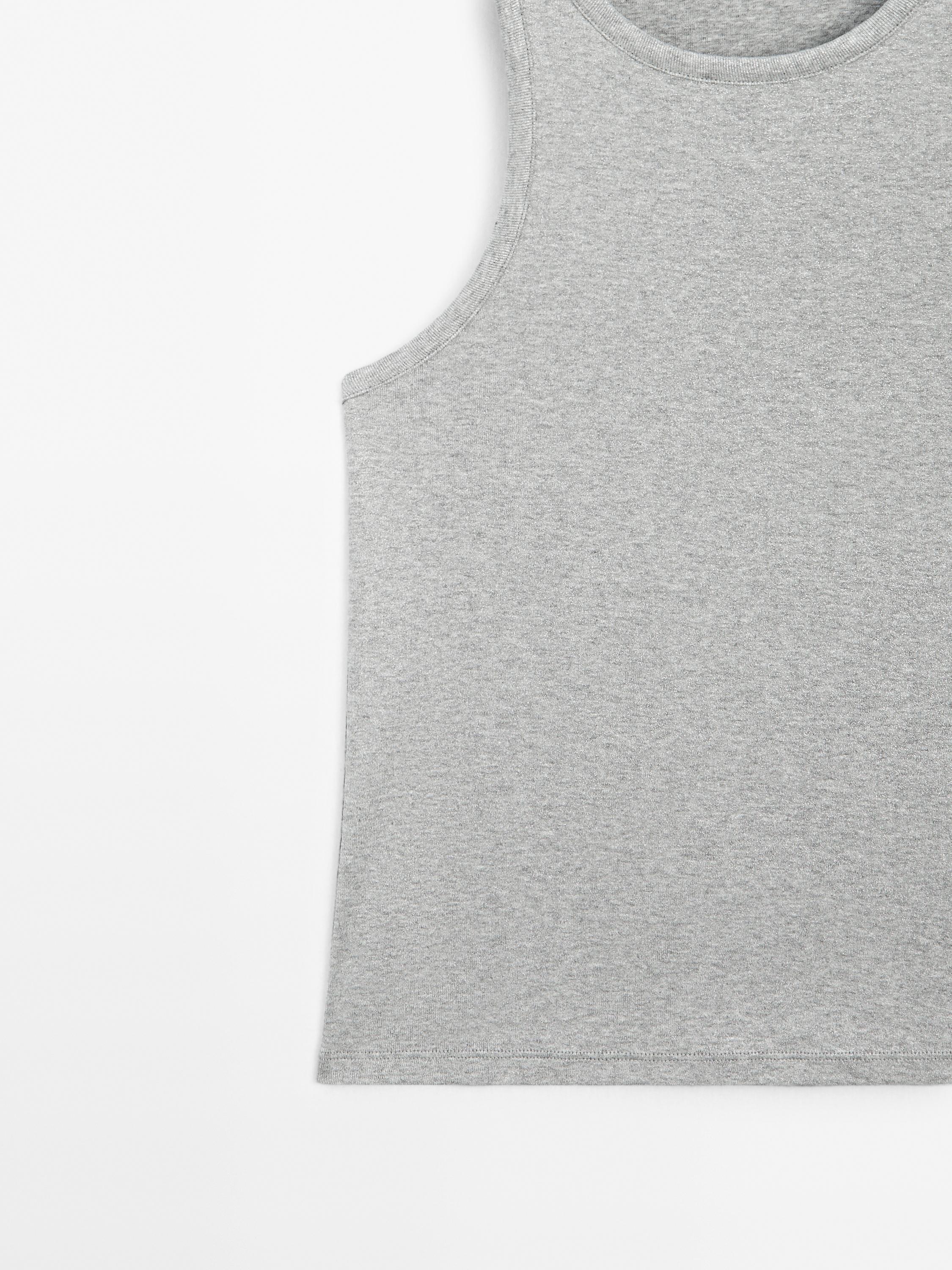 Round neck top with shimmery detail