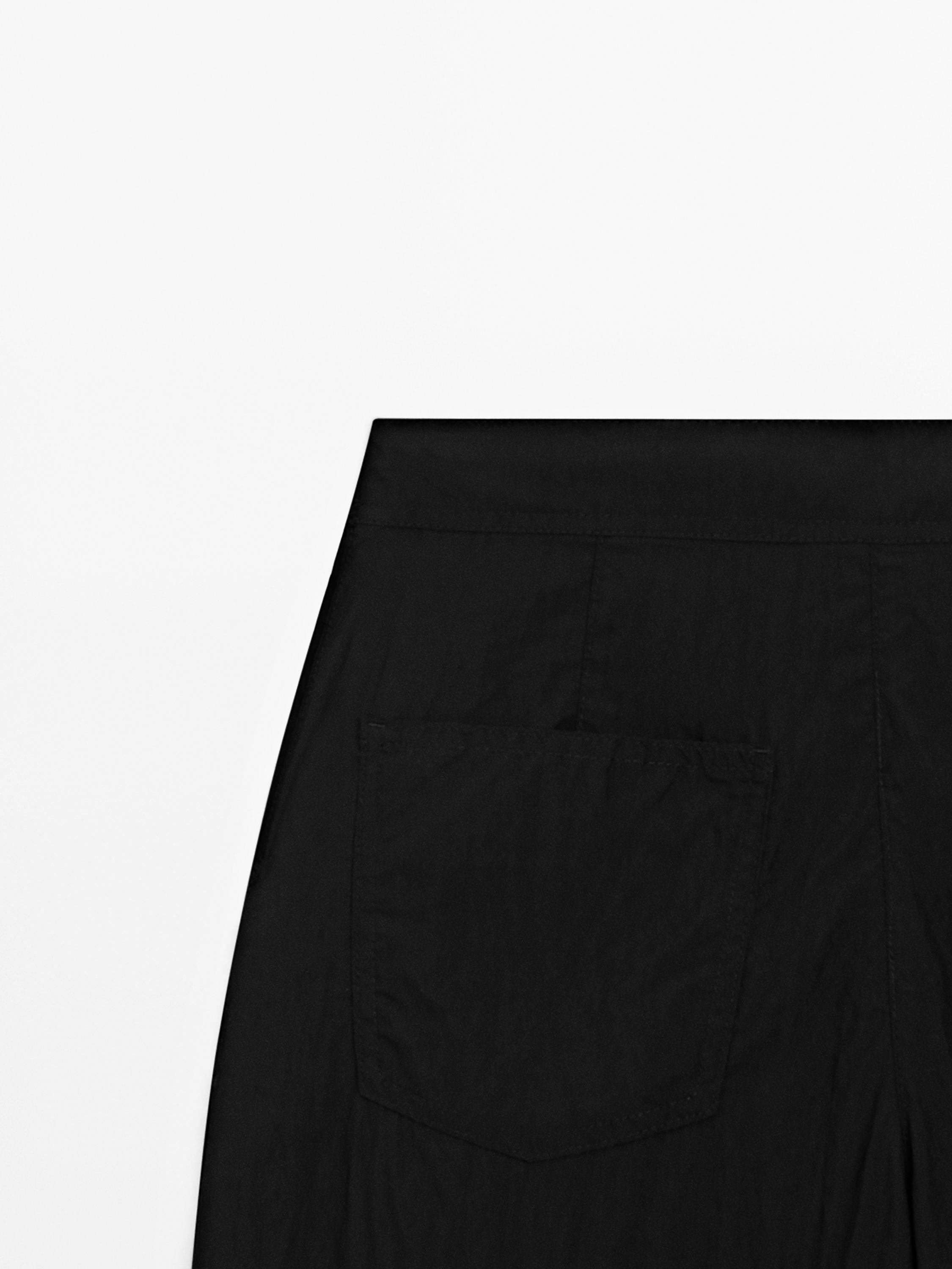 Pantalon palazzo fluide à pinces