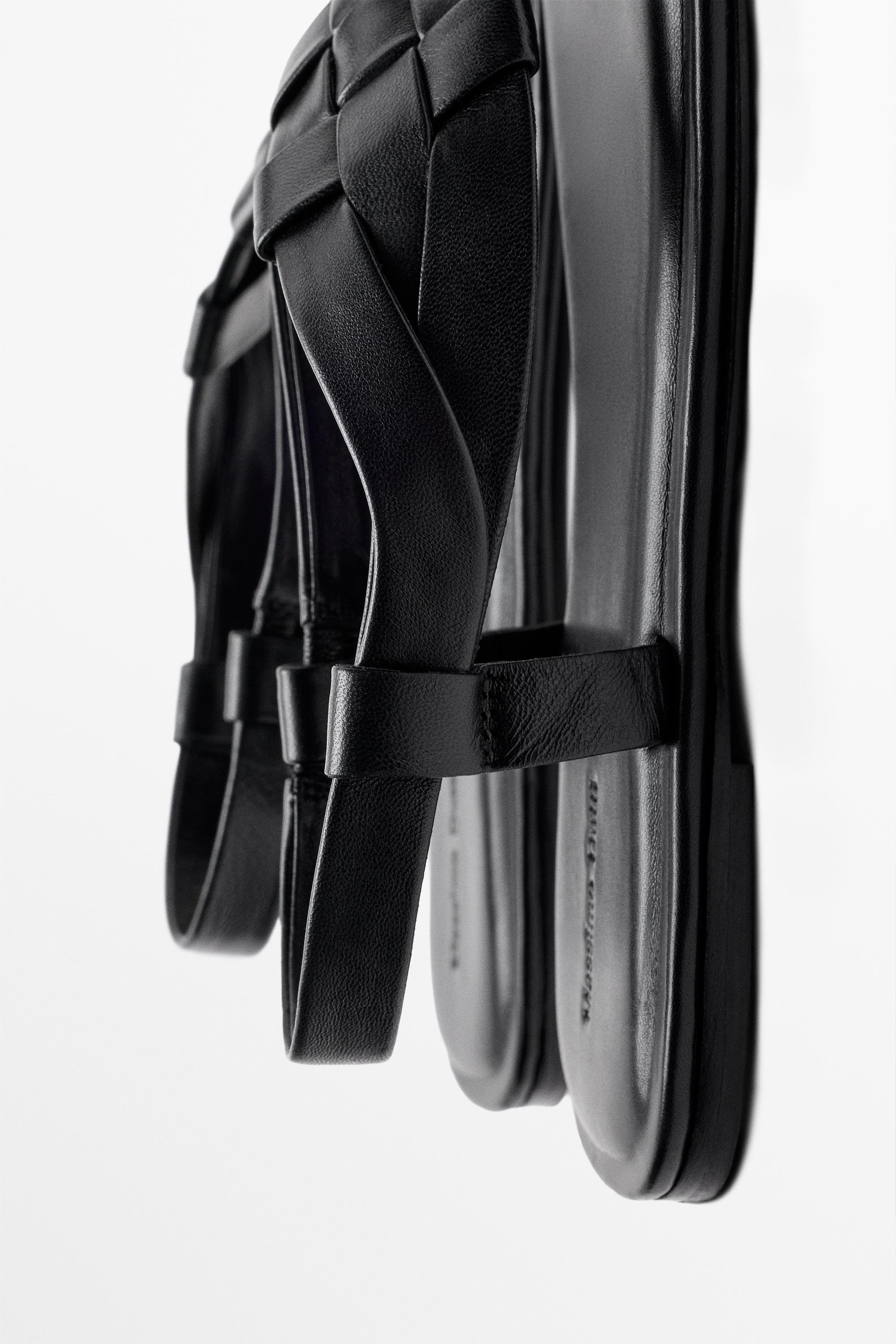 Flat woven leather sandals — BLACK