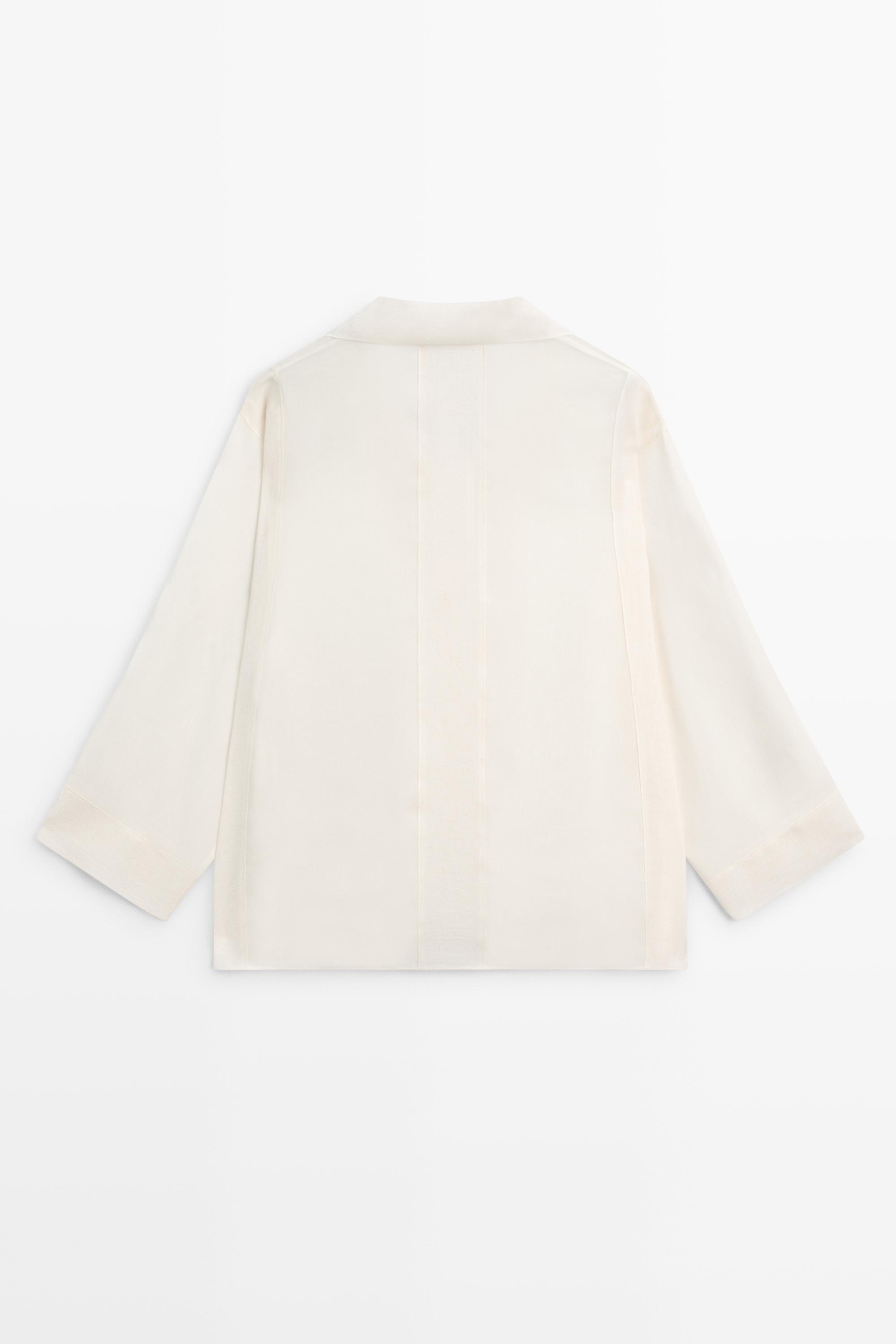 Flowing blouse with seam details — CREAM