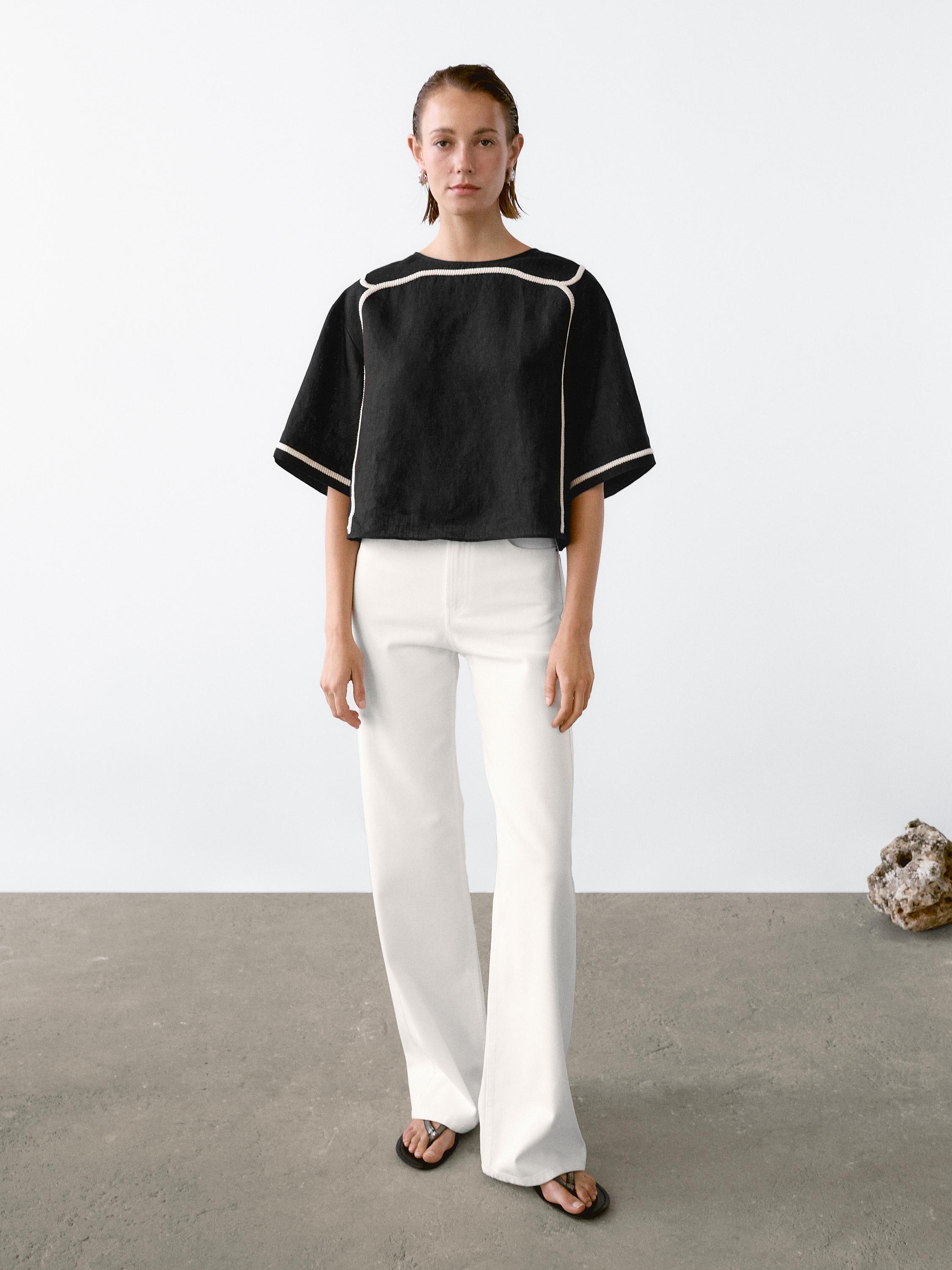 Blouse with contrast embroidery