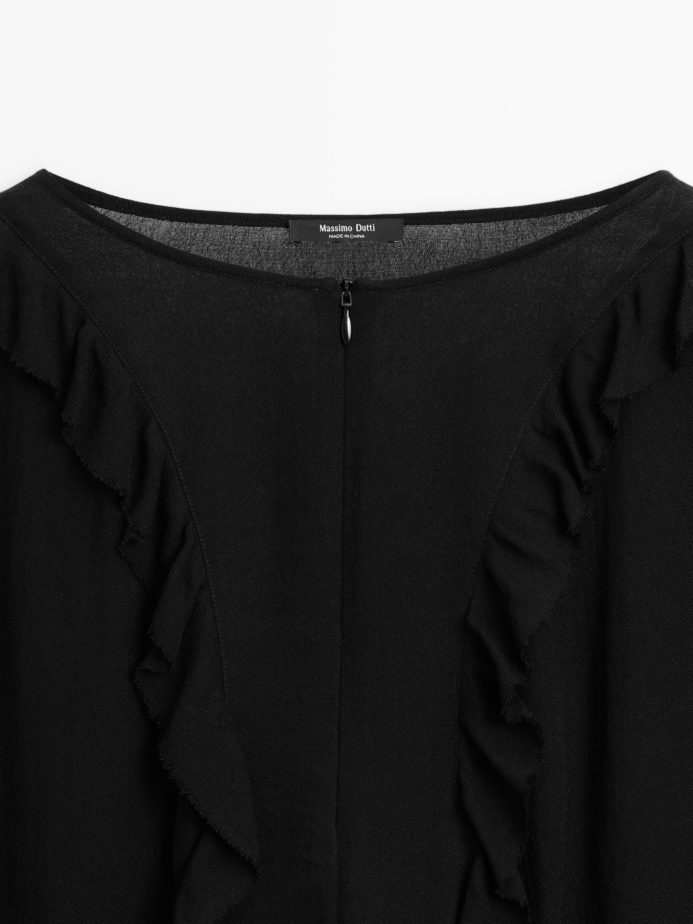 Blusa fluida volantes cremallera