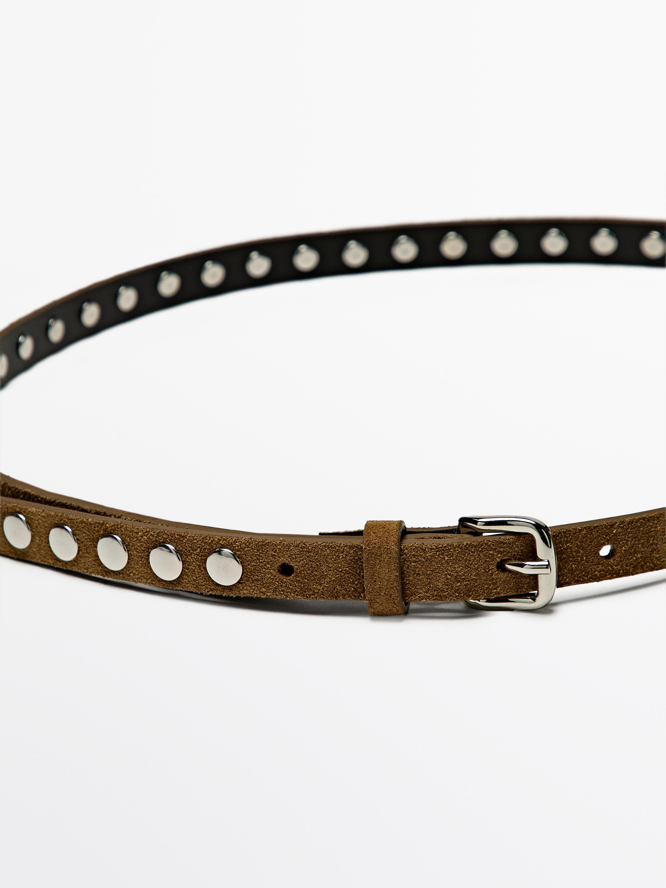 Cinturón fino detalle tachas piel